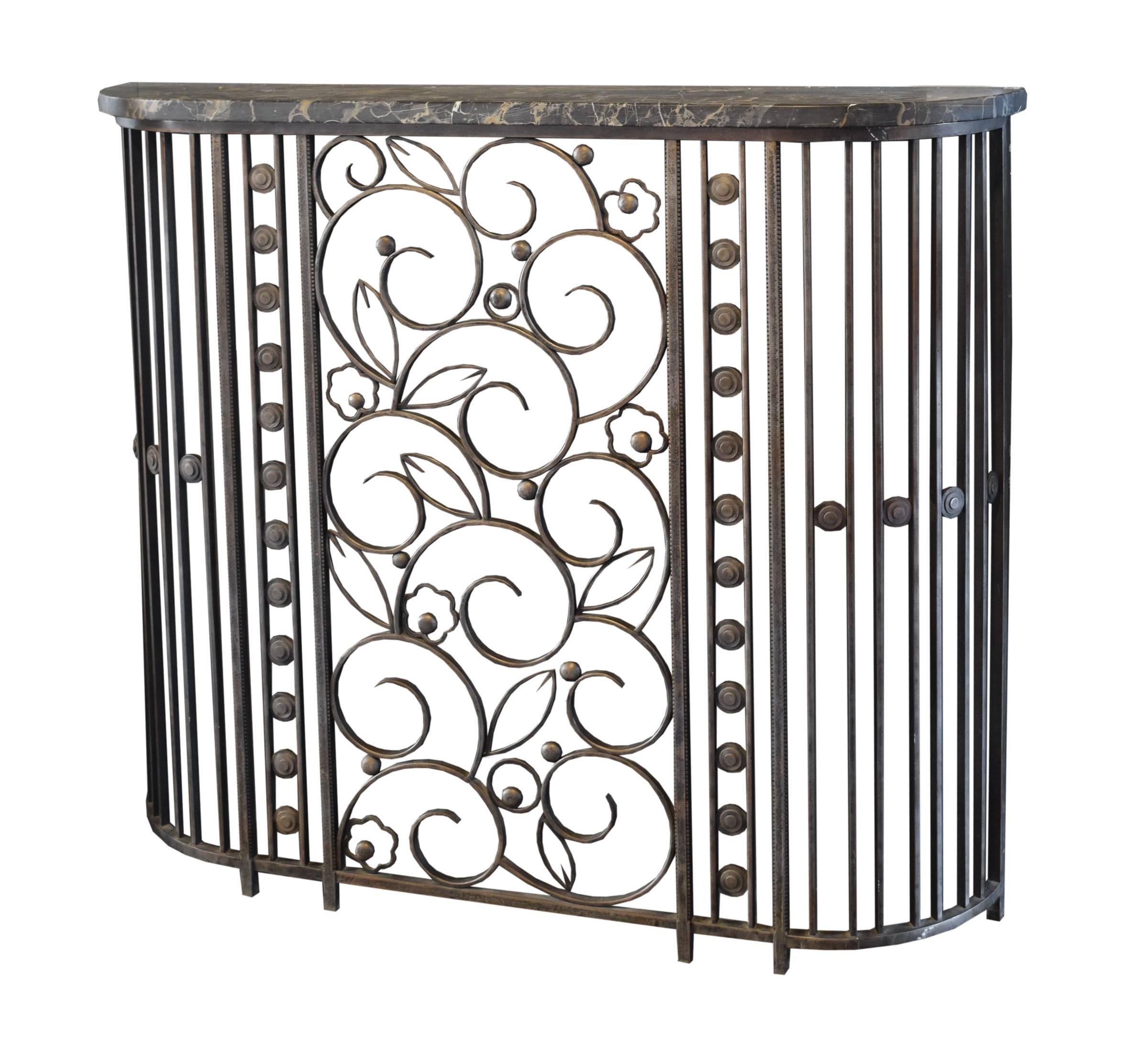 The best French fer forge wrought iron console table with a Classic Art Deco pattern and original marble top, stamped E. Brandt. By famed French artist and blacksmith Edgar Brandt, circa 1930s.