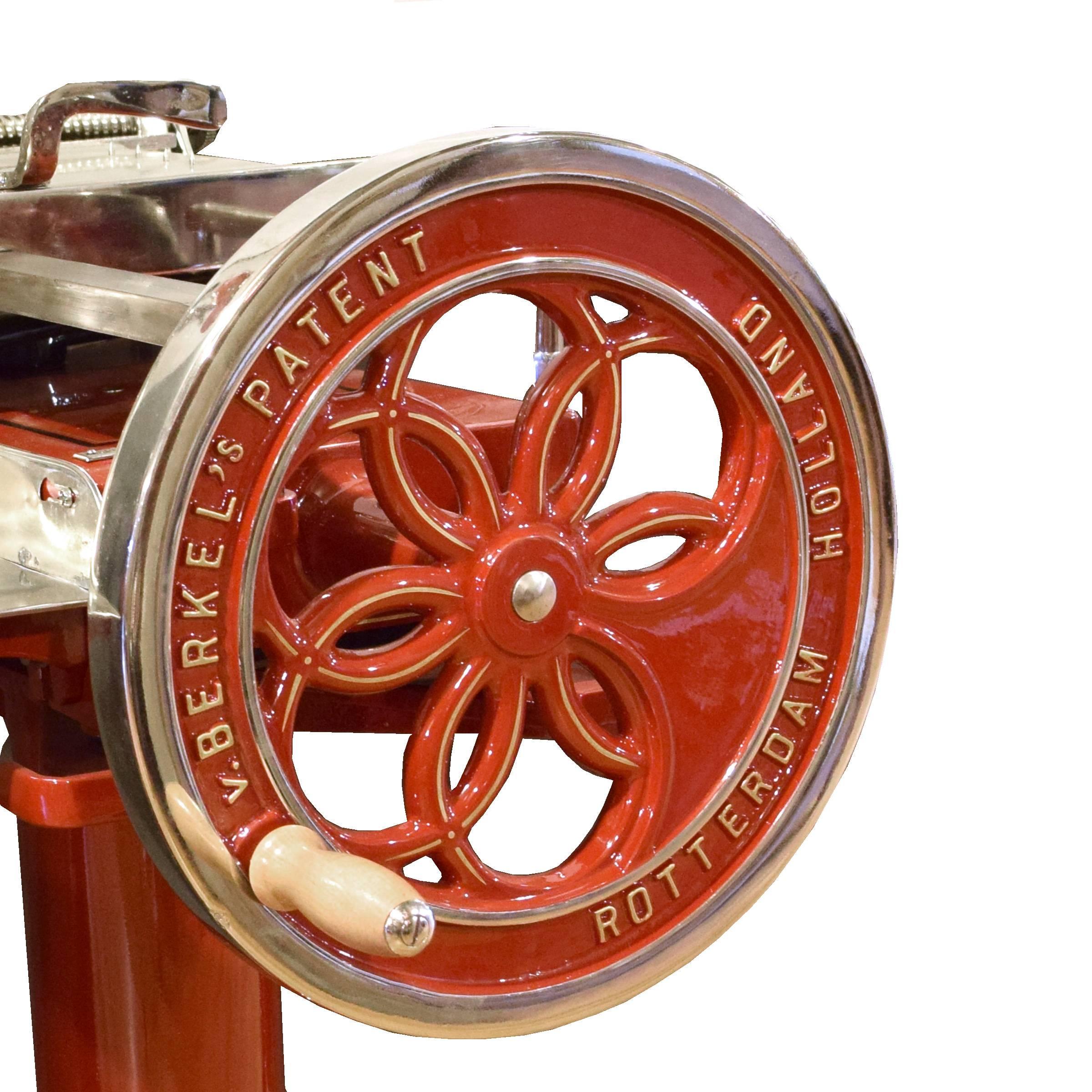 A rare Berkel Model 1 slicing machine in a high gloss red enamel with gold pinstriping, manufactured in Rotterdam, Holland. This model, made from 1908-1915, was revolutionary for its time and is thus the most coveted of the rare Berkel models. It is