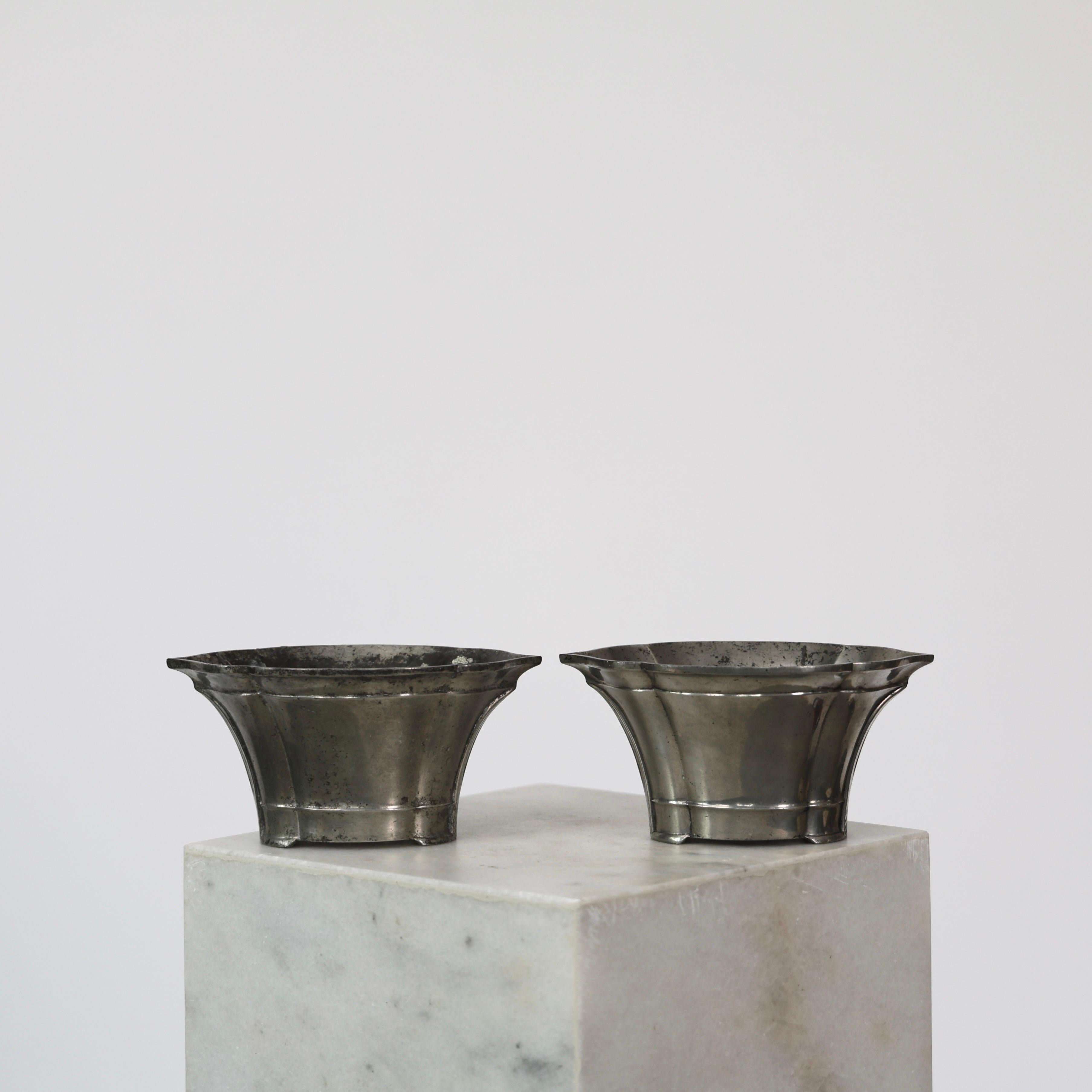 Lovely Pewter Planters made by Just Andersen in the 1920s. 

* Set (2) of oval pewter flowerpots 
* Designer: Just Andersen
* Manufacturer: Just Andersen
* Style: 1220
* Year: 1918-1926
* Condition: Fair vintage condition. Makers engravings intact.