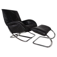 Sillón de cuero con reposapiés de WK Möbel, diseñado por Robert Haussmann, 1970