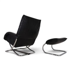 Sillón de cuero con reposapiés de WK Möbel, diseñado por Robert Haussmann, 1970
