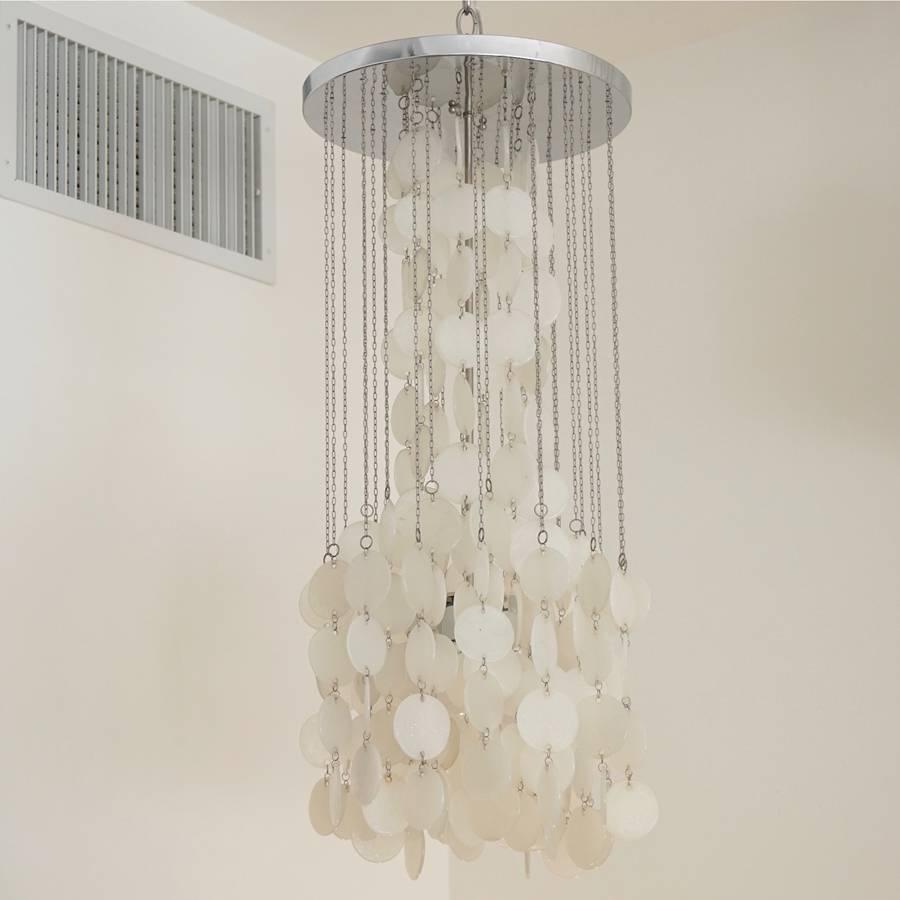 Mazzega cascade chandelier. White glass disks suspended on nickel chains.
Two available.
Priced individually.