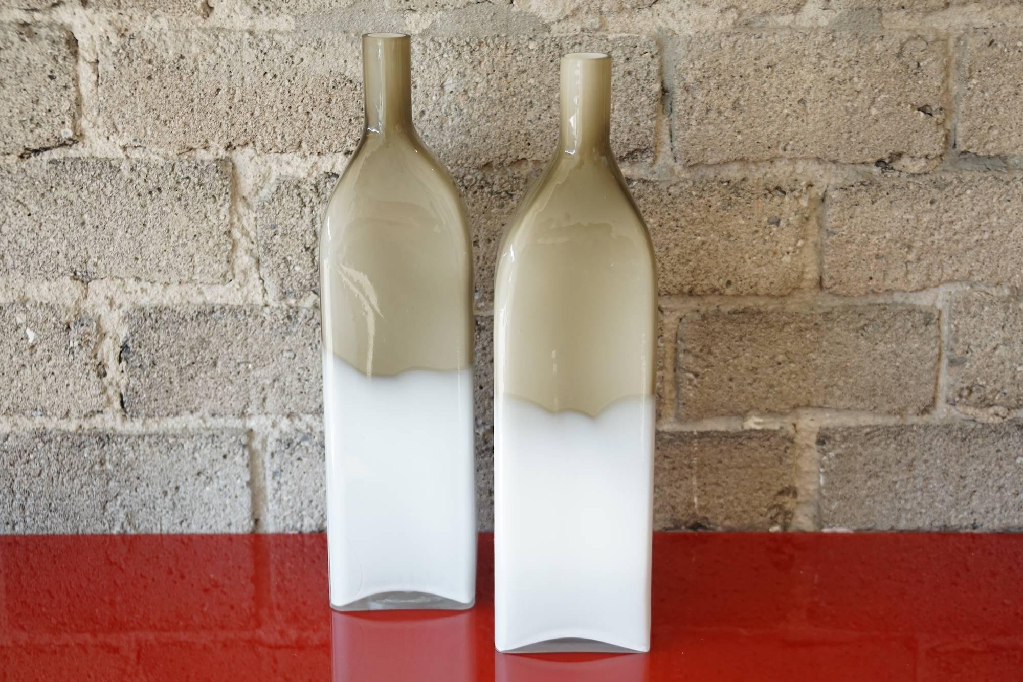 Pair of Mid-Century cased glass bottles.