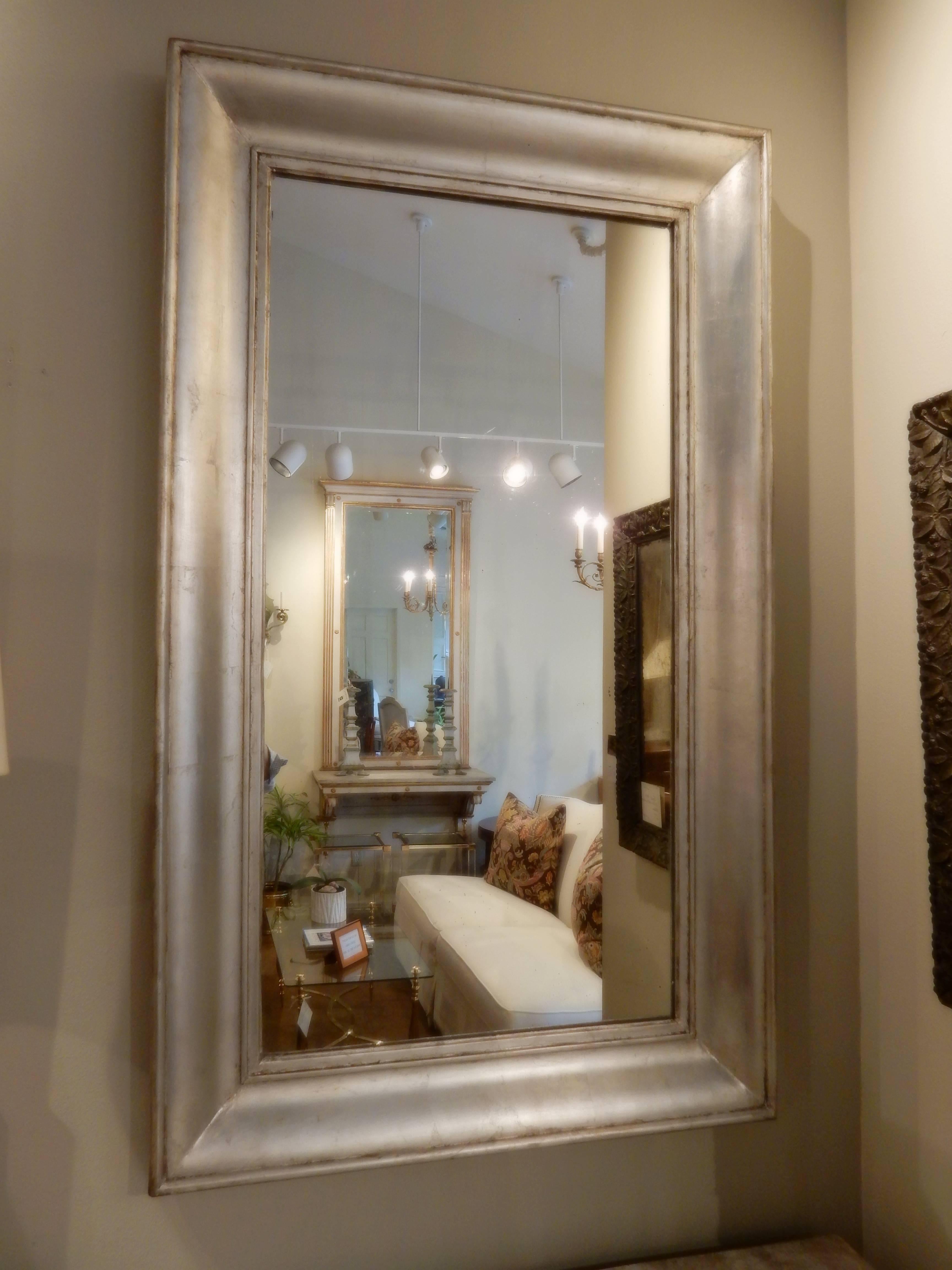 Pair of silver leaf 19th century French mirrors with original glass. They are identical except one mirror is 3/4