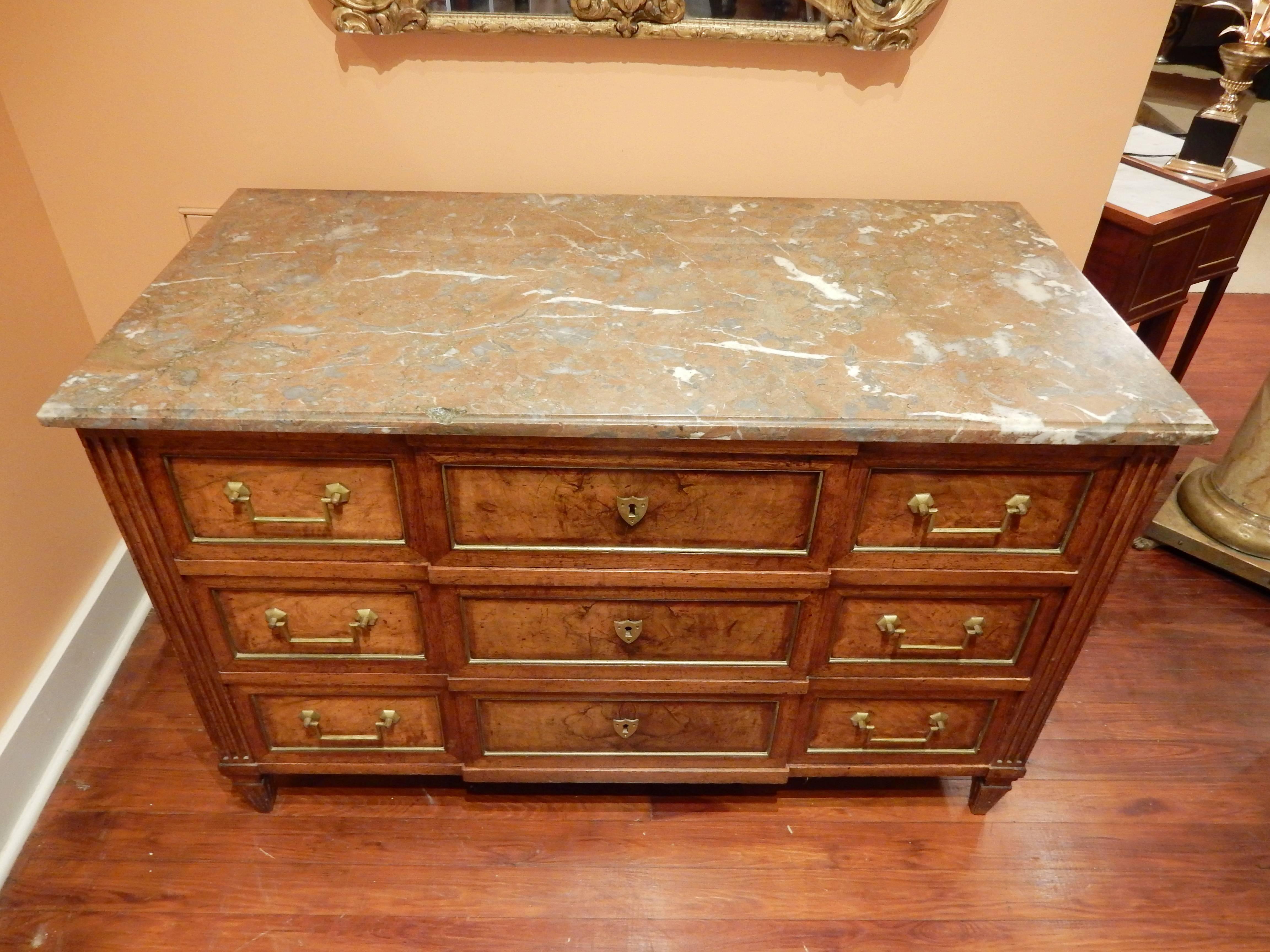 Beautiful walnut Louis XVI three-drawer commode with marble top and brass trim on drawers. Very nice warm patina.
