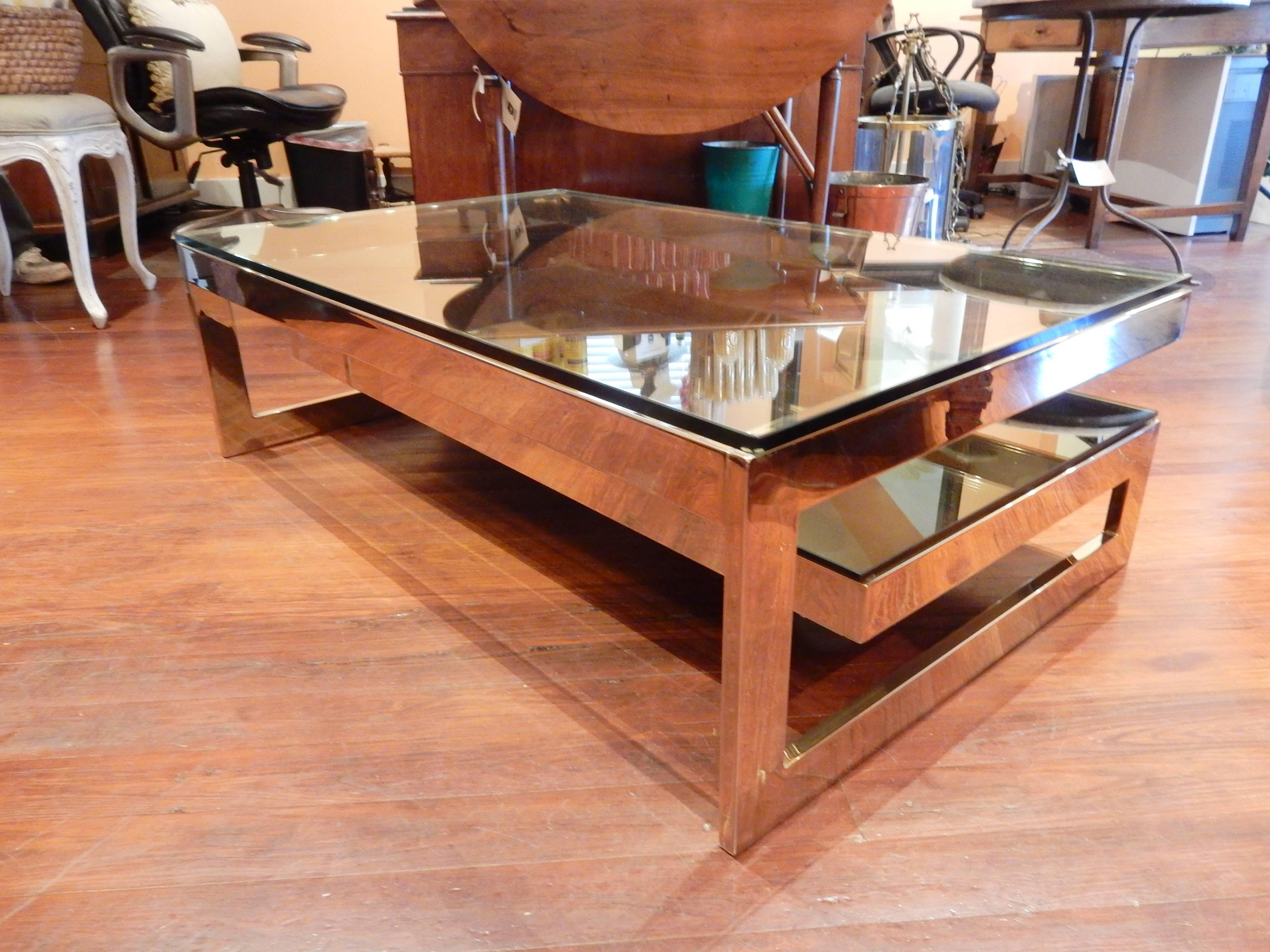 Belgium 1970s G design coffee table with gold washed brass finish. Top glass is clear and bottom glass is smoked.