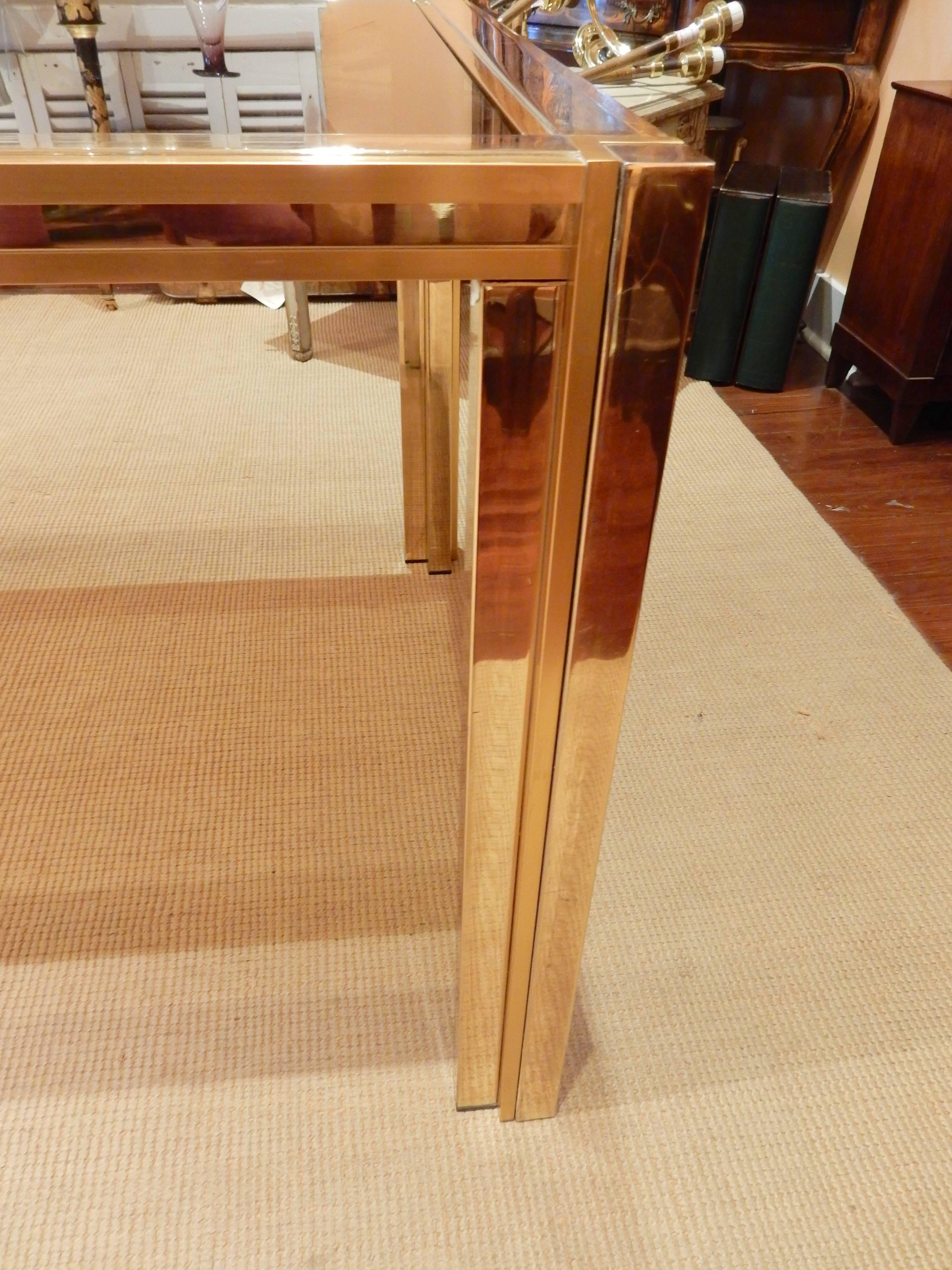 Romeo Rega attributed Mid-Century Modern brass, chrome, and glass dining table. Not signed. Very good quality has a nice worn patina with a made in Italy tag underneath.
