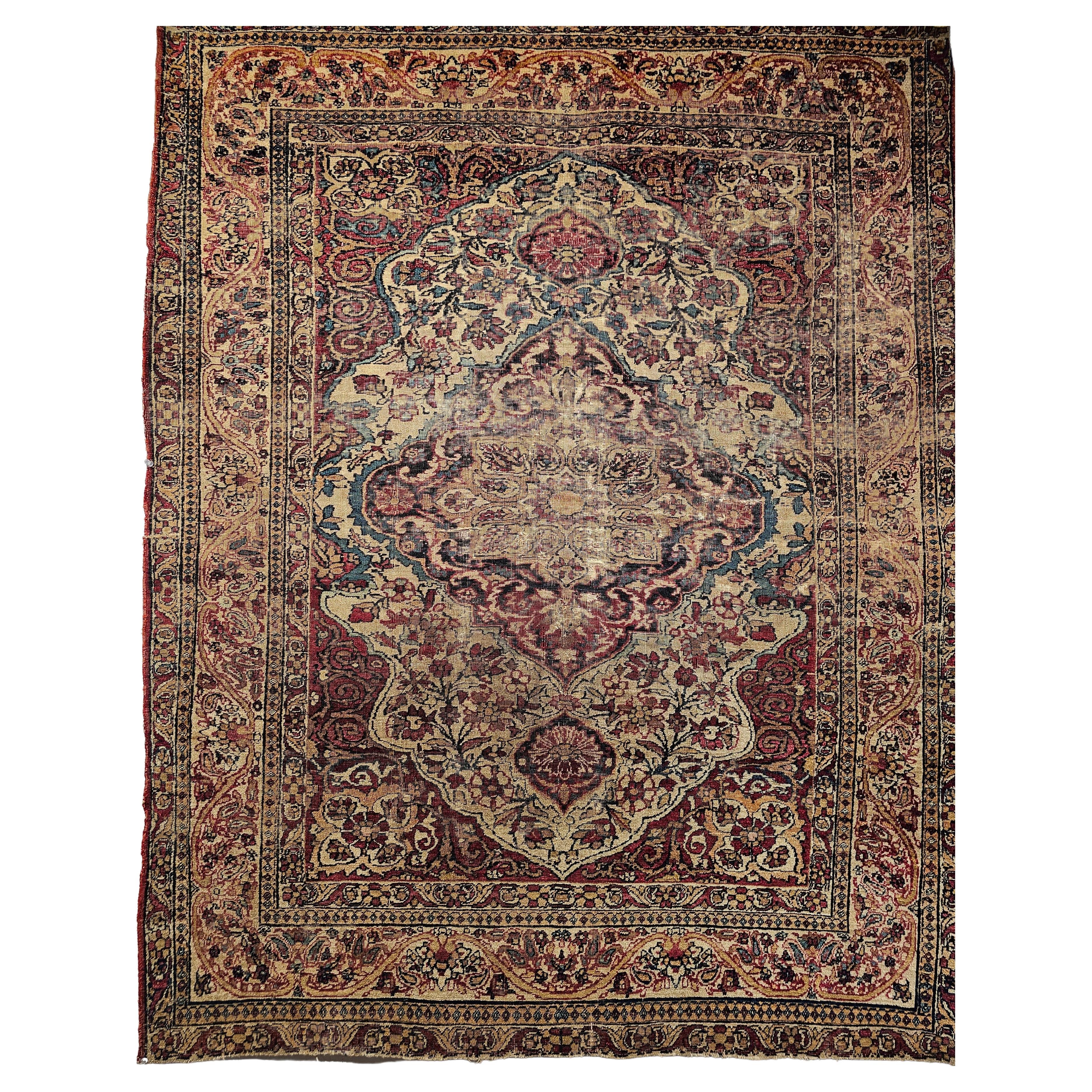 19th-Century Persian Kerman Lavar Area Rug in Floral Design in Ivory, Red, Blue For Sale