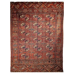 Tekke turcomano vintage con diseño integral en rojo, azul marino, marfil, amarillo y azul
