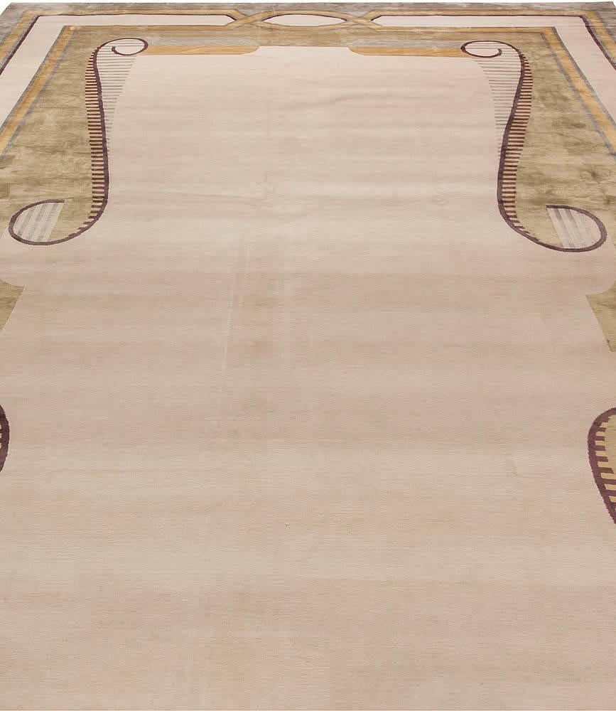 This imposing oversized rug represents the essence of Art Deco, it is a reminder of the crazy and fancy 1920s in great Gatsby style. Its graceful and classy design enchants from the very first glance, whereas its soft and luminous pile is simply