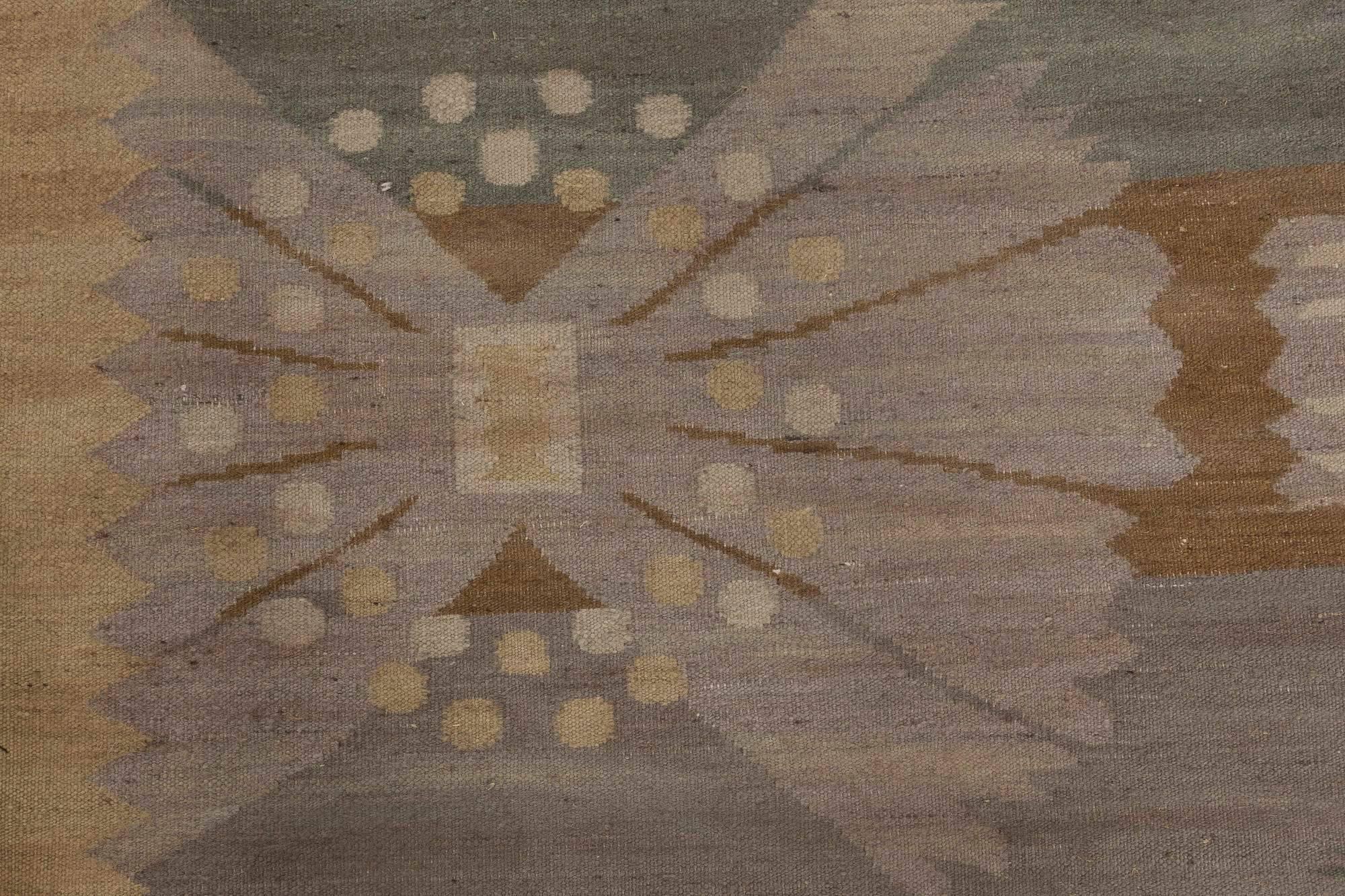 Swedish design flat-weave rug.
Size: 12'5