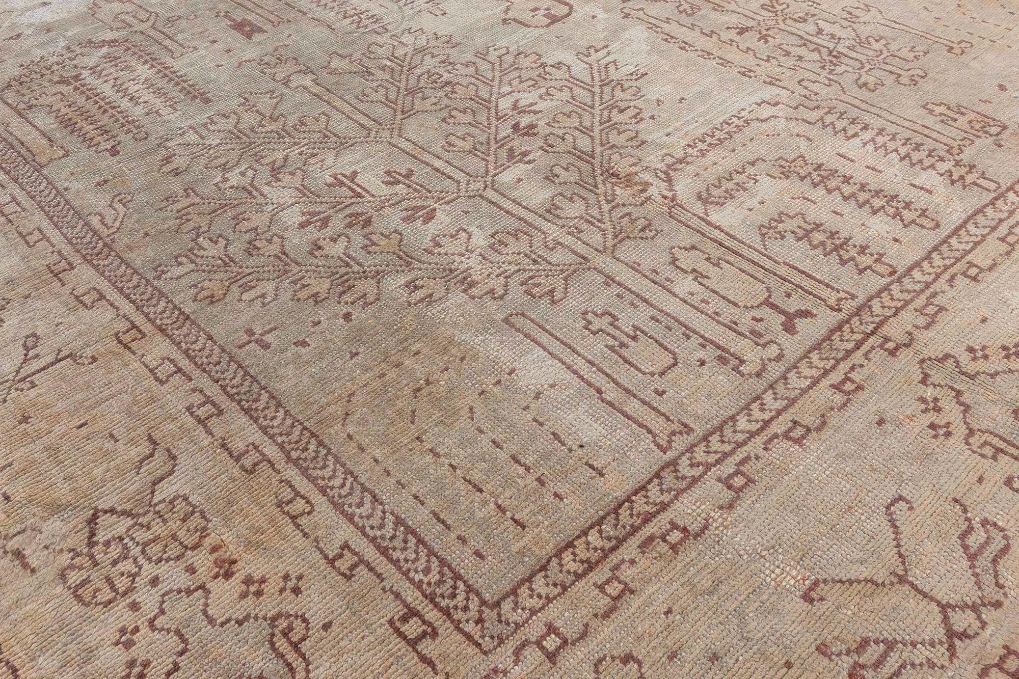 20th Century Antique Turkish Oushak Hand Knotted Wool Rug For Sale