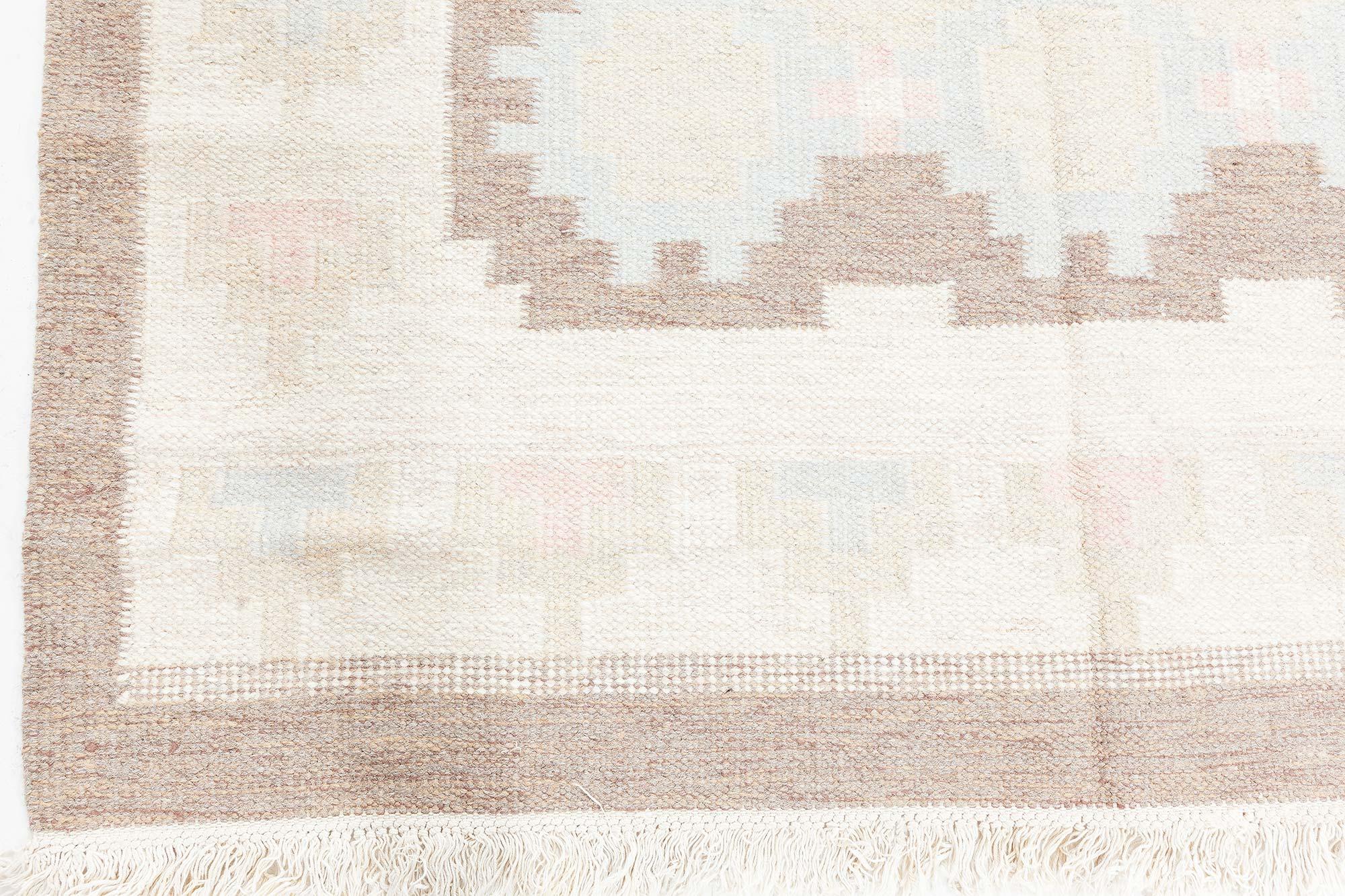 Mid-20th century Swedish beige, brown and blue flat-weave wool rug
Size: 5'9