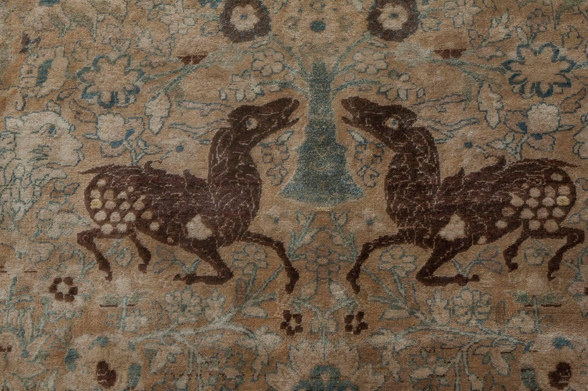 Antique Persian Kirman Carpet
Size: 10'3