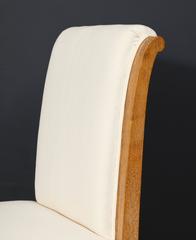 A Set of 12 Oak Dining-chairs with Leather Upholstery