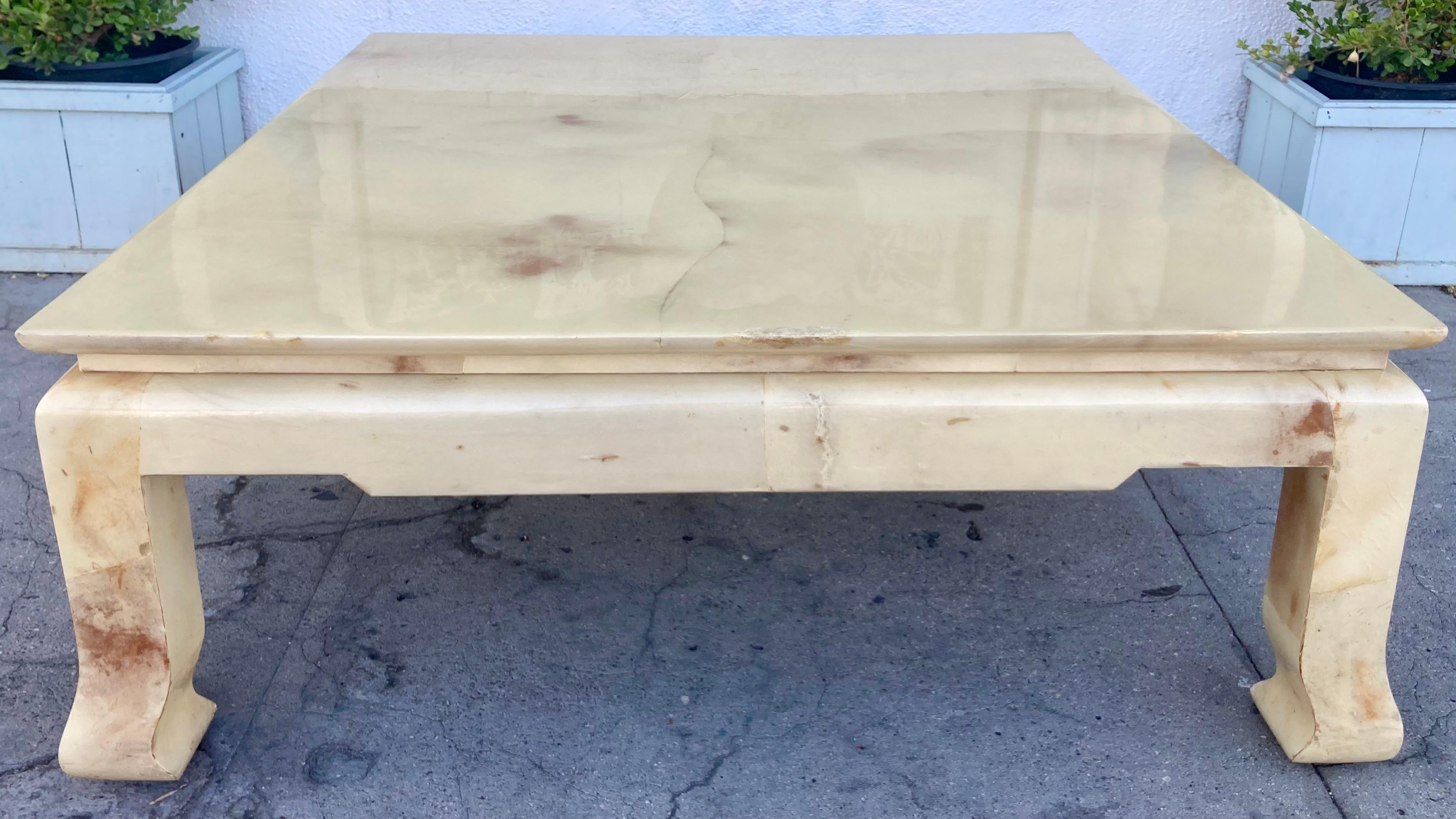 Karl Springer Asian inspired parchment covered coffee table in original lacquered finish. Very large square shaped coffee table with the perfect amount of surface space to display your favorite collections.