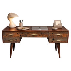 An Organic Timber Desk Befit with Five Drawers & Gilded Handles