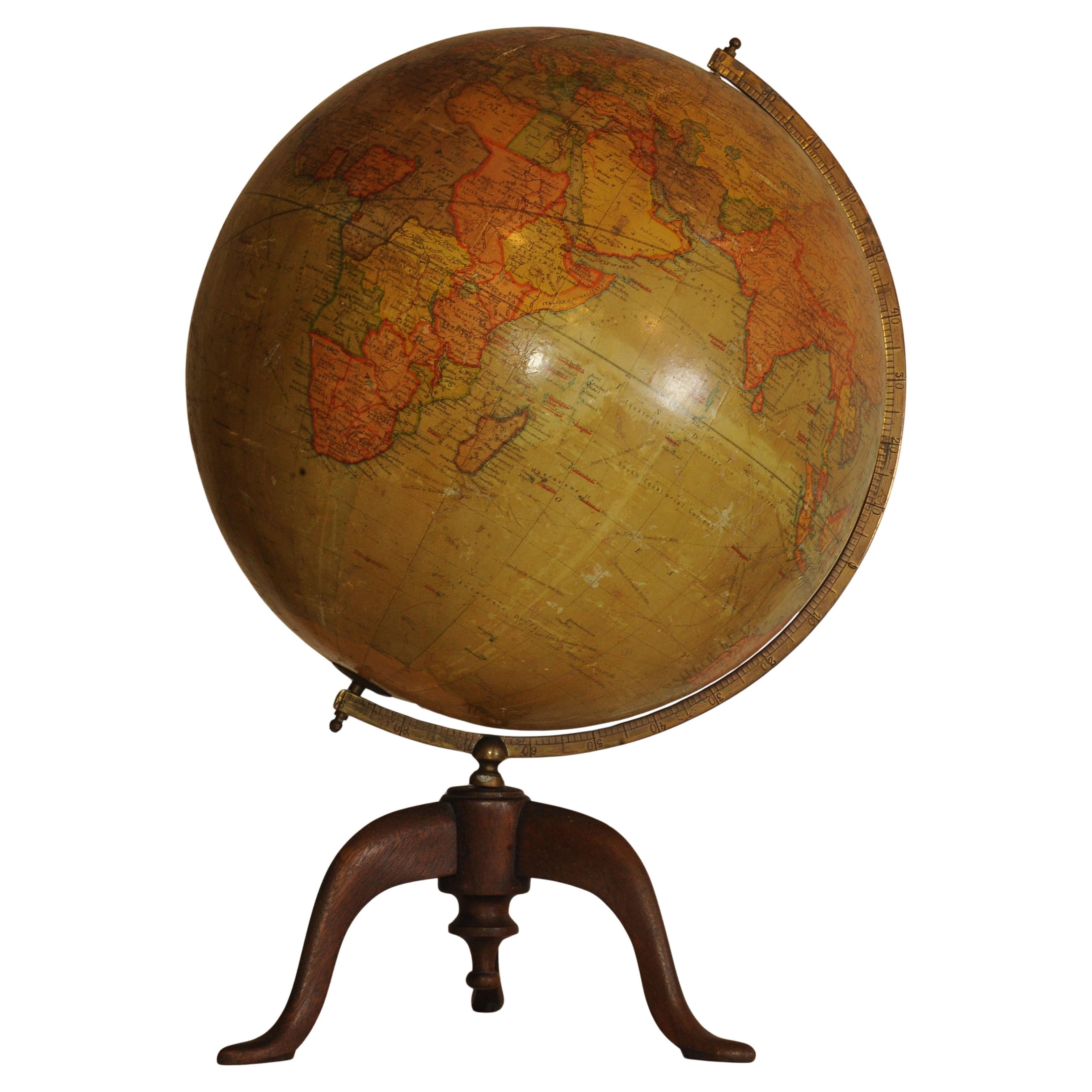 vintage globe on wooden stand