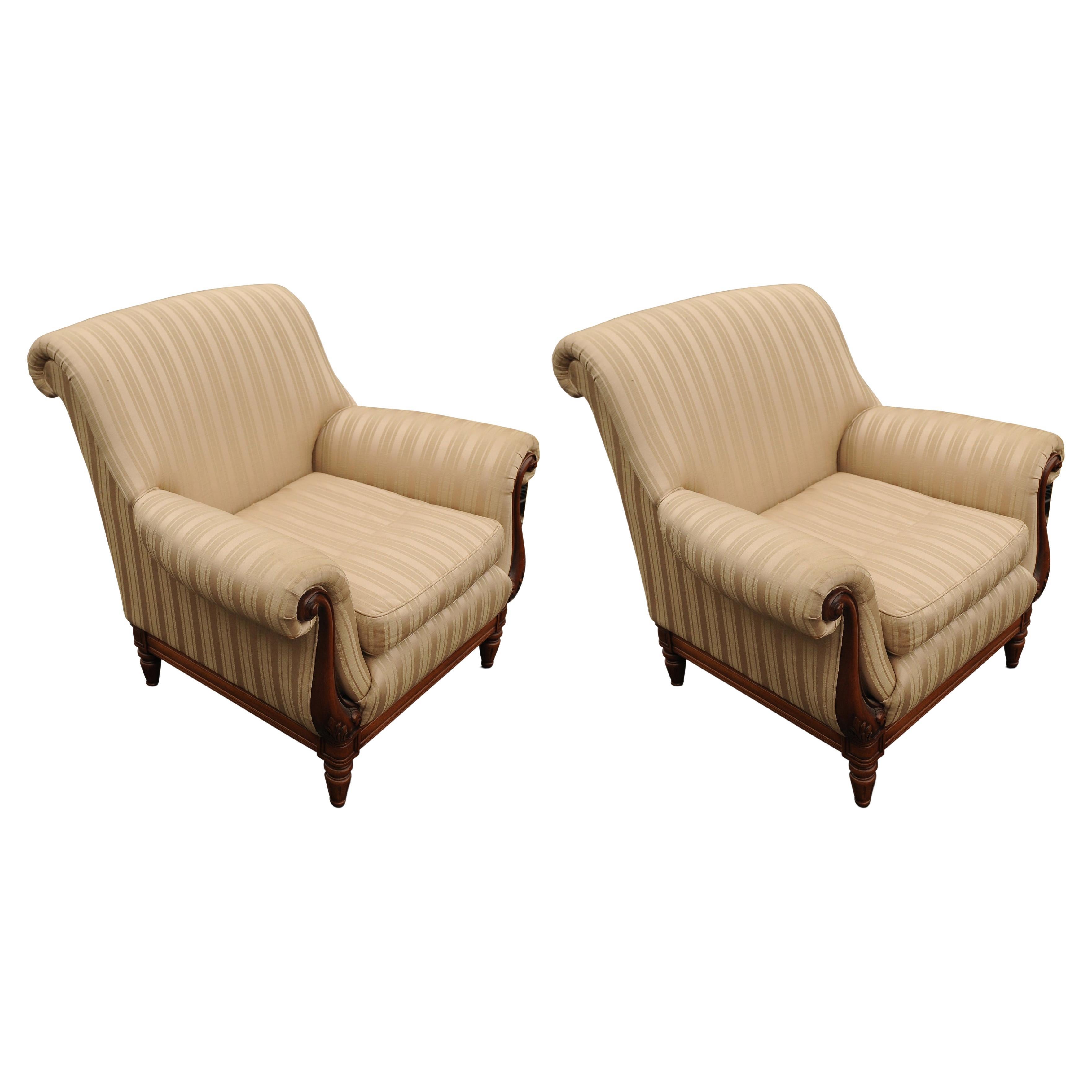 A Classic Pair Of William IV Empire Design Library Armchairs Striped Cream Upholstery - Late 20th Century 

The striped upholstered backs above a loose cushioned seat between bateau forming scroll arms, raised on turned and fluted legs to the