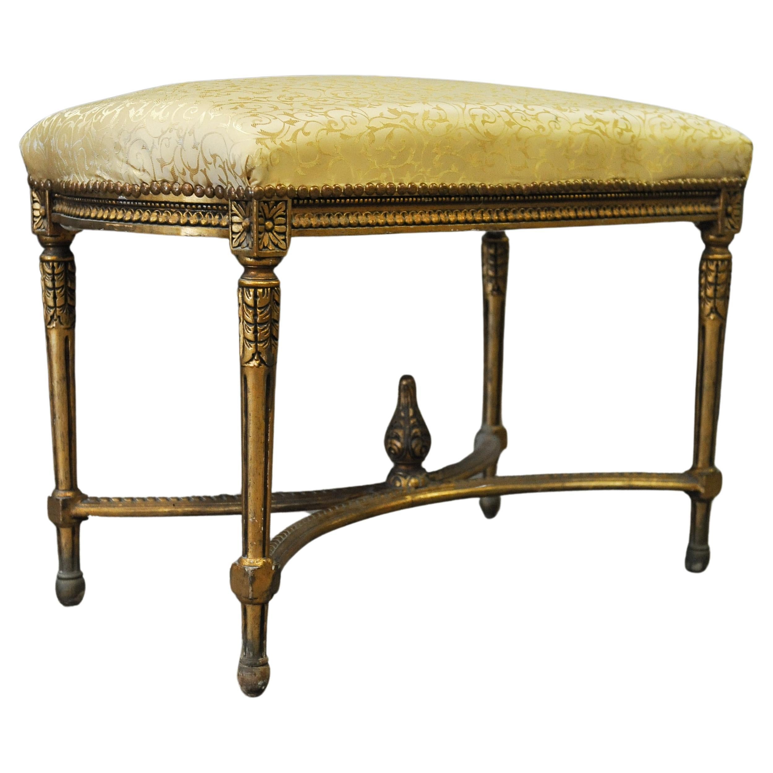 French Gilt Wood Bench Window Seat With Gilt Carved Floral Motifs, Befitted With Damask Floral Gold Upholstery, Finished With Brass Stud Detailing 1800's

