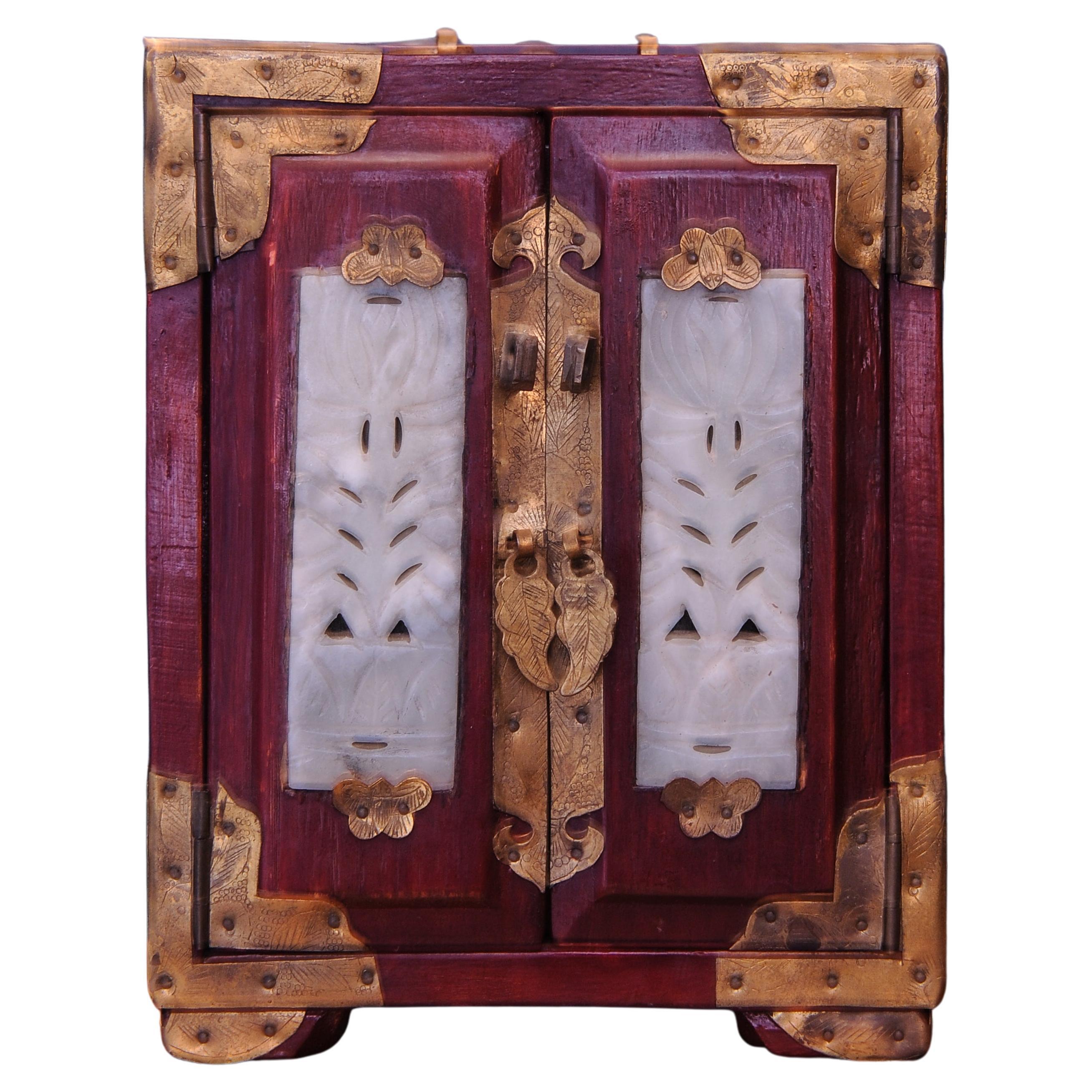 Antique Chinese Mahogany Brass and Jade Traditional Keepsake Cabinet 
Three drawer Jewellery Cabinet Chest or Box

Three drawer patterned silk lined cabinet 
In good vintage condition, lovely Christmas gift.  
