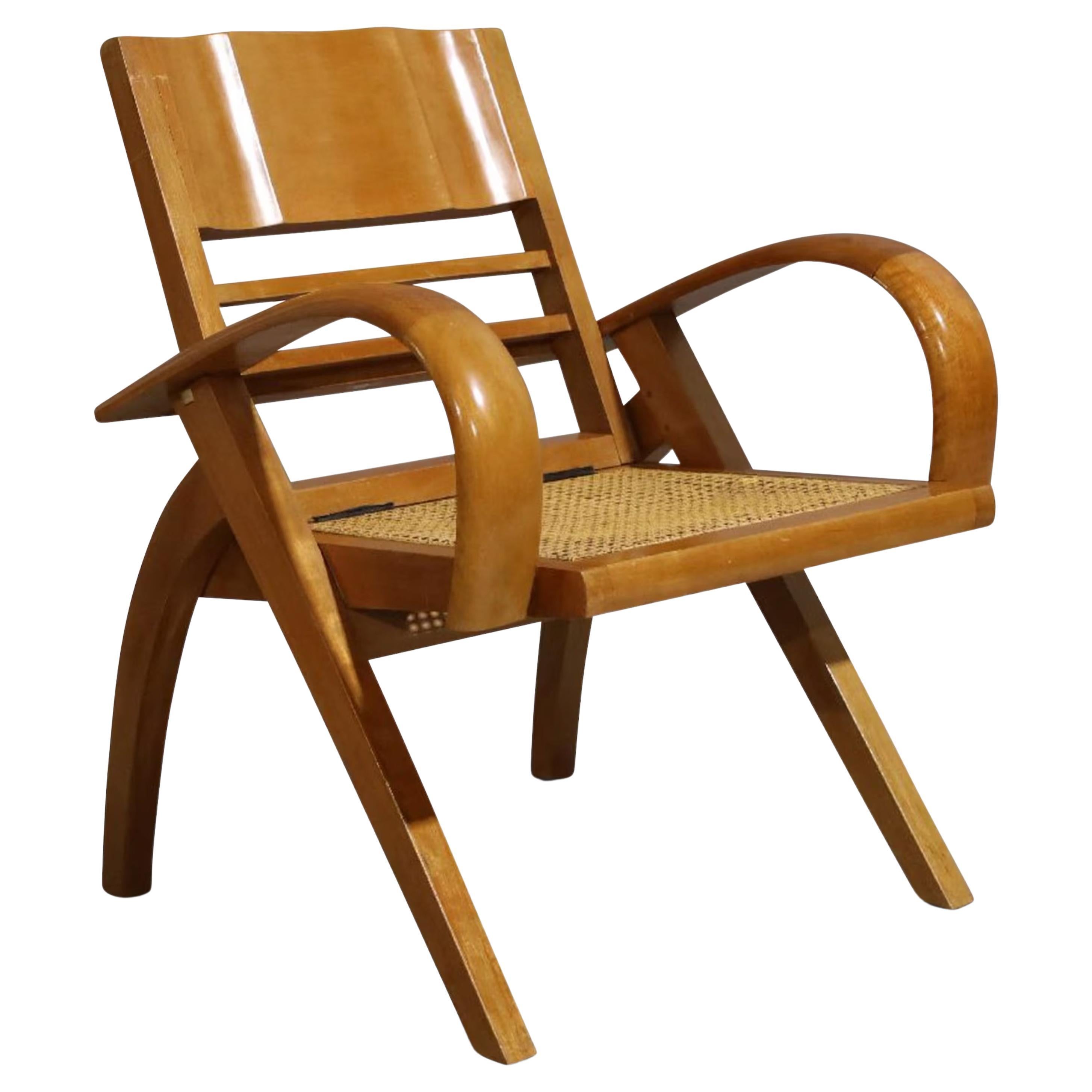 An Early 20th Century French Art Deco Satinwood & Cane Folding Armchair 1920s For Sale