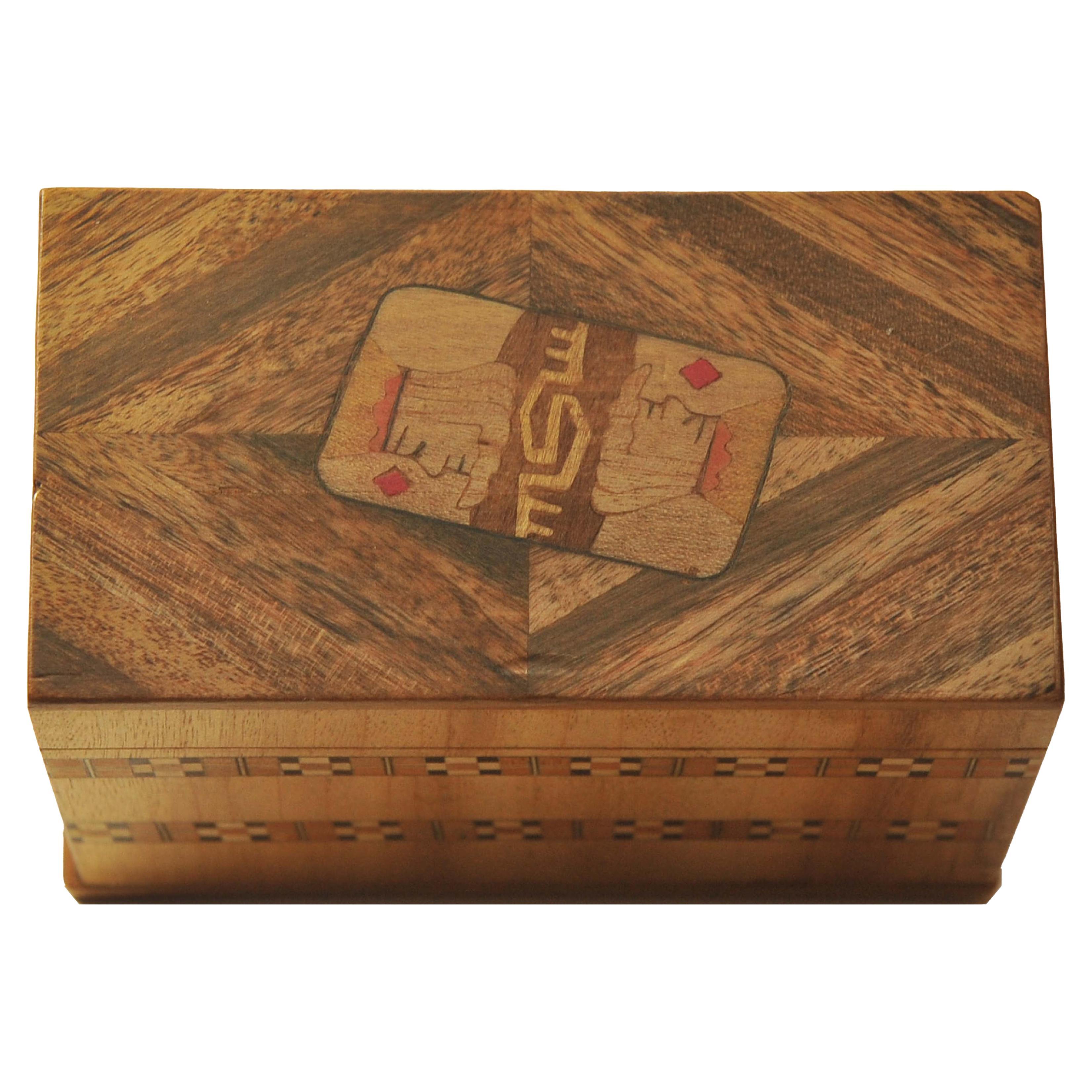 #5A

A Vintage Set of WW1 Aviation & Naval Playing Cards with Wooden Marquetry Tunbridge Ware Card Box Decorated With The King of Diamonds

In Tonbridge (near to Tunbridge Wells), George Wise (1703–1779) is known to have had a business in 1746. It