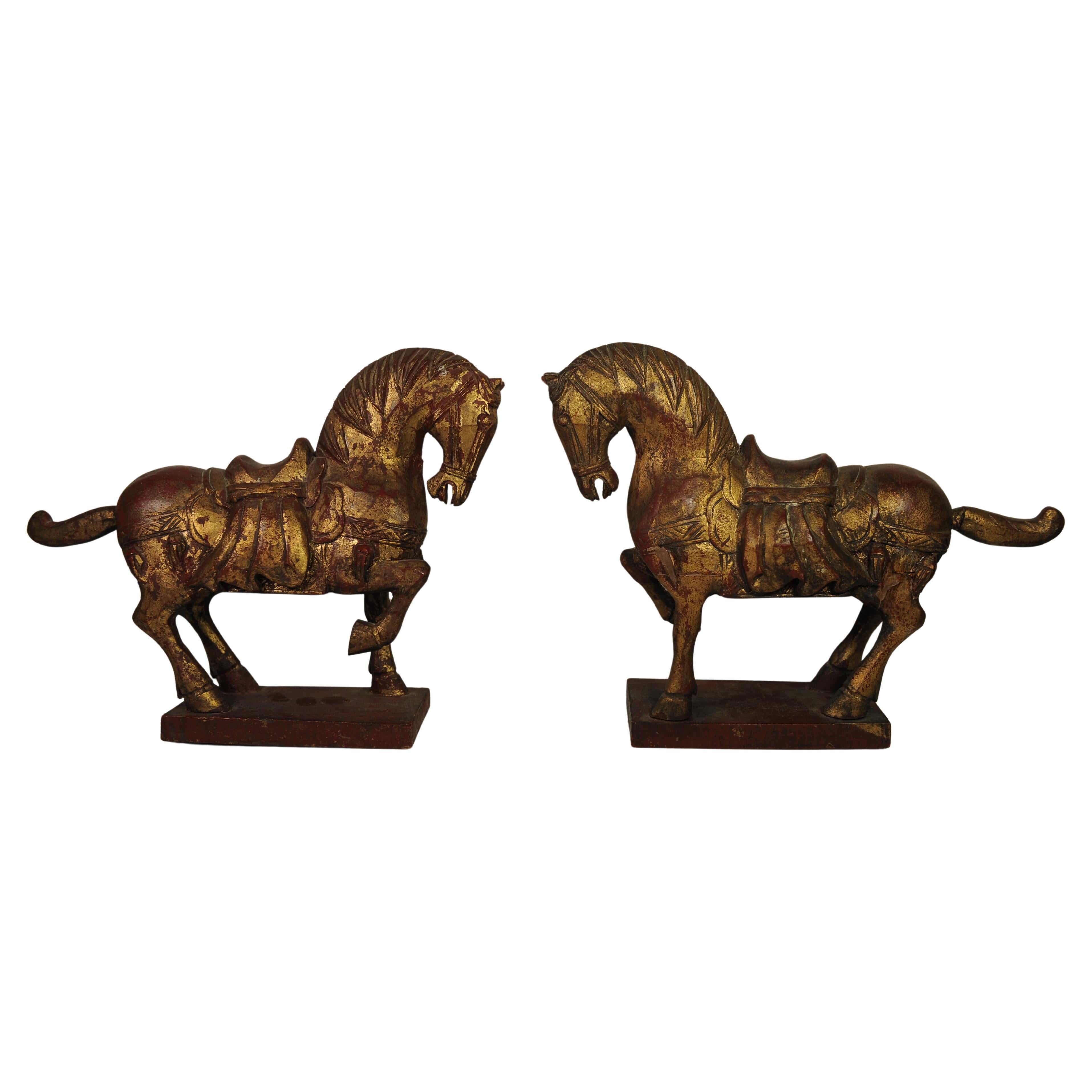 A Vibrant Pair of Tang Dynasty Style Hand Painted & Hand Carved Chinese Horses - priced as a pair 

Decorative wooden horses that would suitably adorn a shelf, a large desk, or plinth. 

Dimensions of each horse 
Height 25cm
Width 33cm 
Depth of