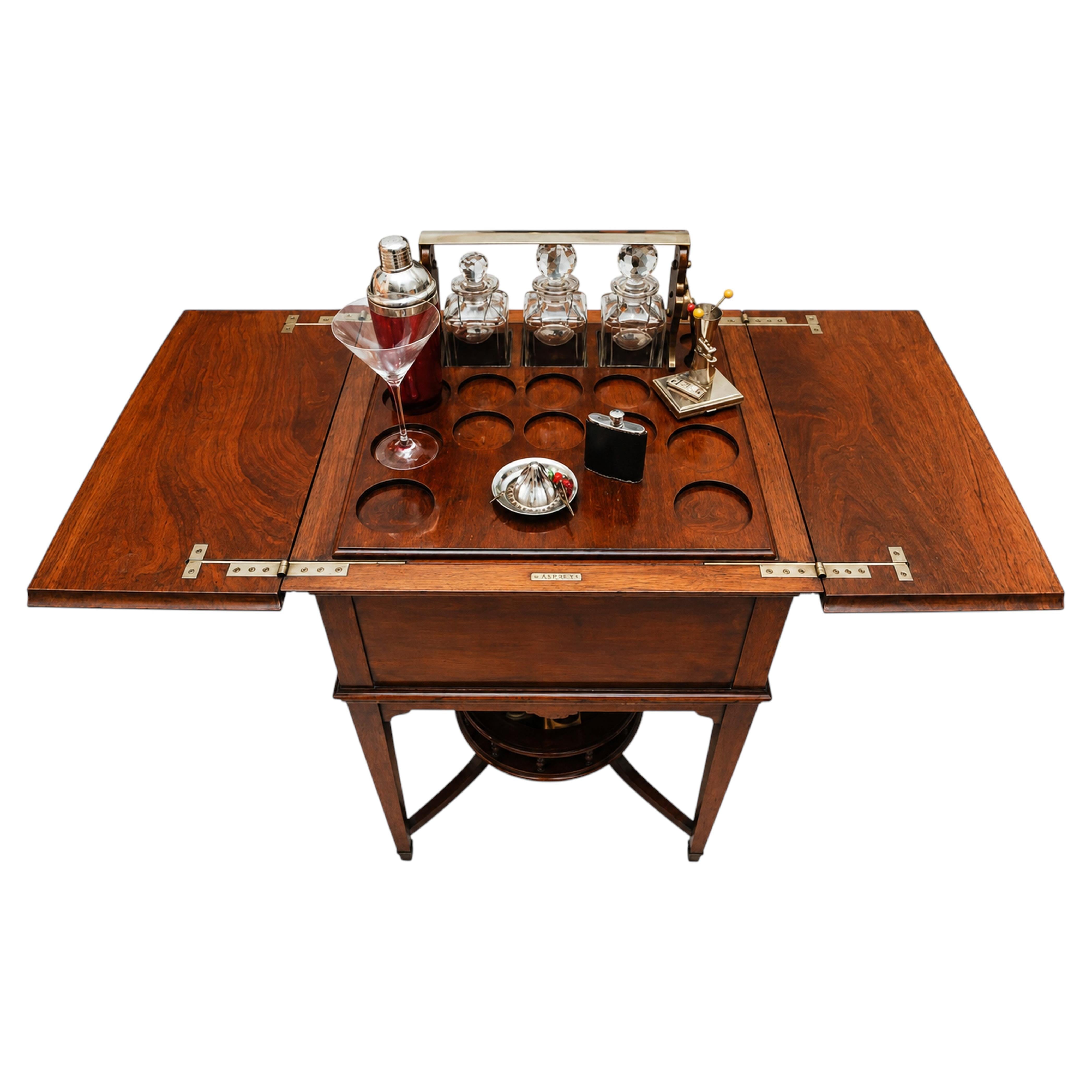A Rare Asprey & Co. London 1920s Mahogany Elevette Drinks Cabinet with Tantalus