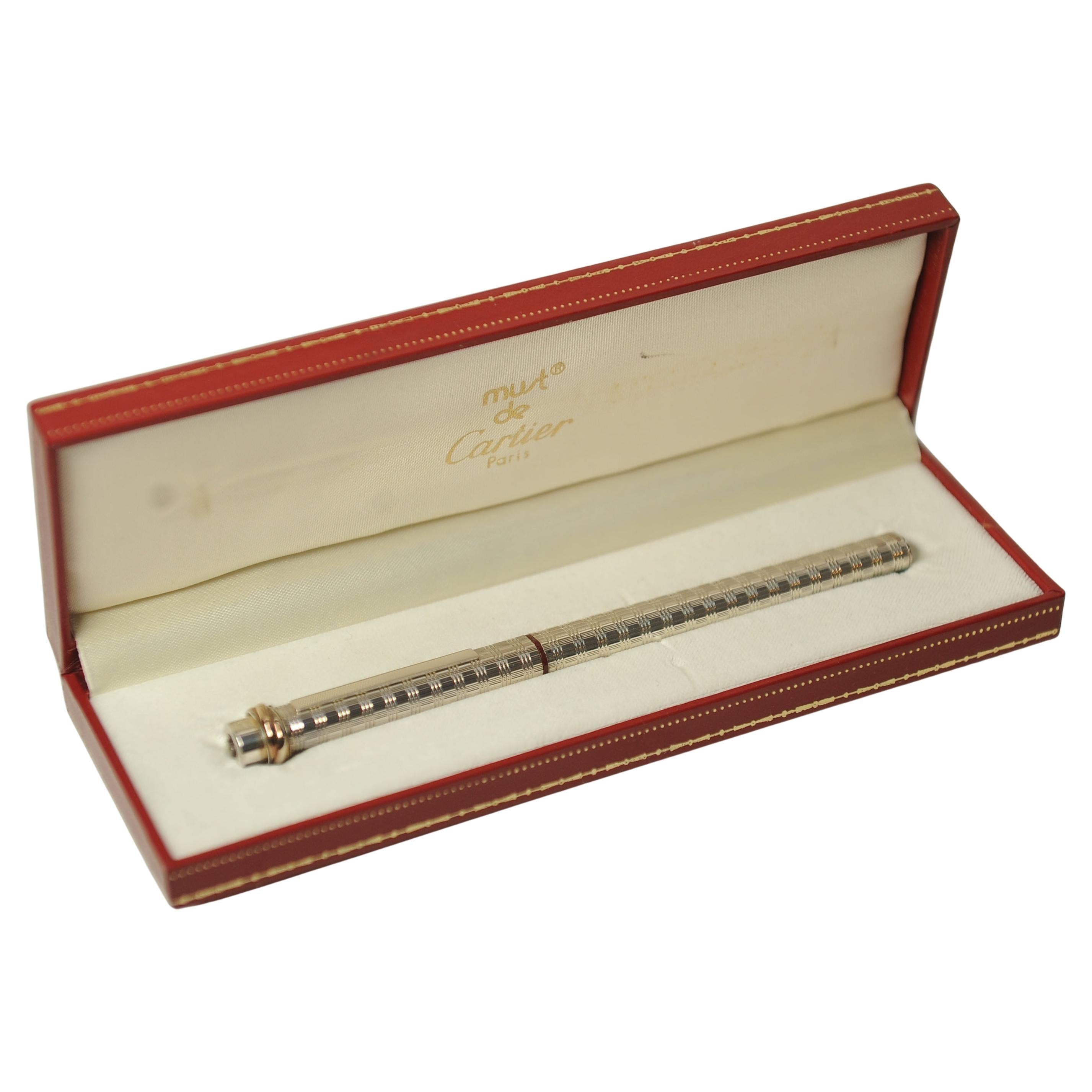Oro Una stilografica Must de Cartier con pennino in oro 18 ct e incassatura in platino in vendita