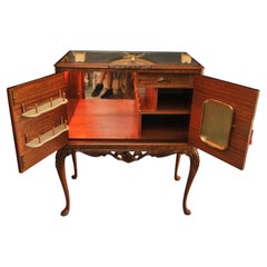 A Luxurious Burr Walnut Cocktail Cabinet With Light & Fitted Mirrored Interior