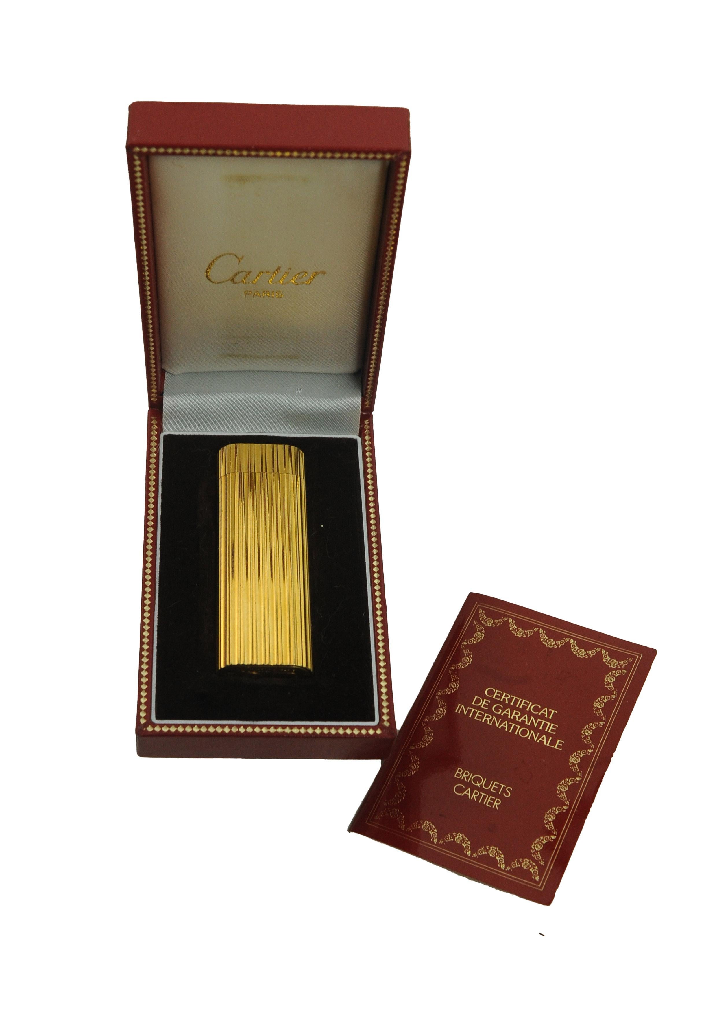 Accendino Briquet per sigarette Cartier in oro 18ct con scatola Cartier 12