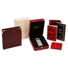 Raro accendino Cartier placcato argento con striscia rossa e portasigarette Cartier rosso