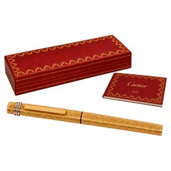 Penna roller classica Cartier Vendome Trinity placcata oro 18 ct.