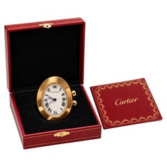 Reloj despertador de viaje Cartier, ovalado y dorado, en caja *Sin gastos de importación a EE. UU.*