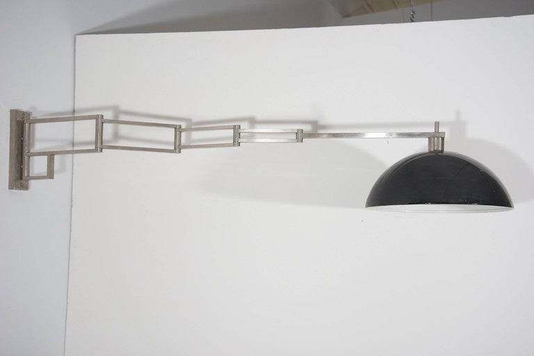 Mid-Century Modern Reggiani Articulated and Adjustable Nickel Wall Light For Sale