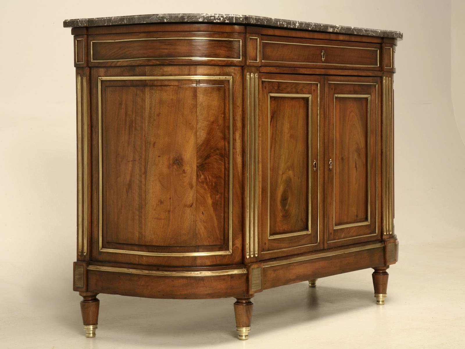 Typically, when we find similar Louis XVI buffets they are almost always mahogany and I cannot remember the last one that wasn’t, until now. This is an incredible French walnut buffet with the most amazing grain patterns, so we took the long way to