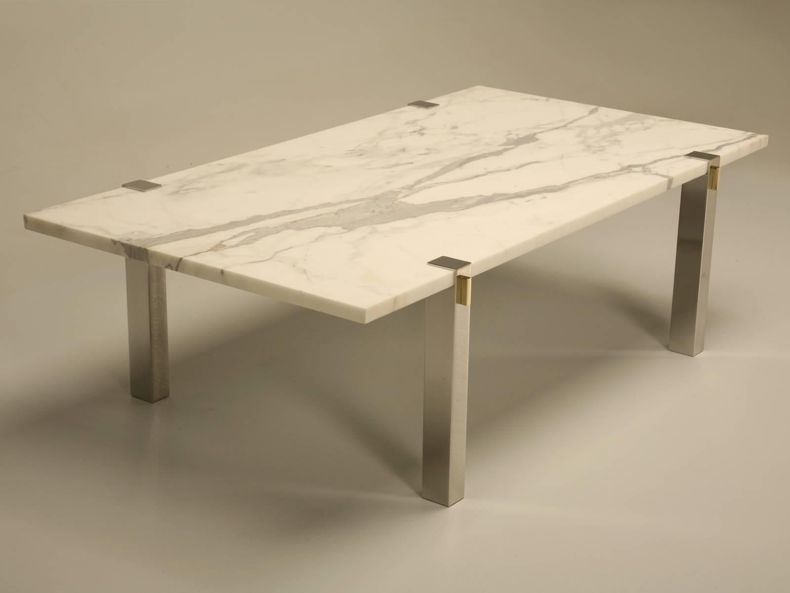 We chose to construct the Coffee Table Legs out of Solid Stainless Steel and inserted a small decorative Brass Decorative Detail. The Stainless Steel has been Hand-Polished to a mirror finish and will require no maintenance and is virtually