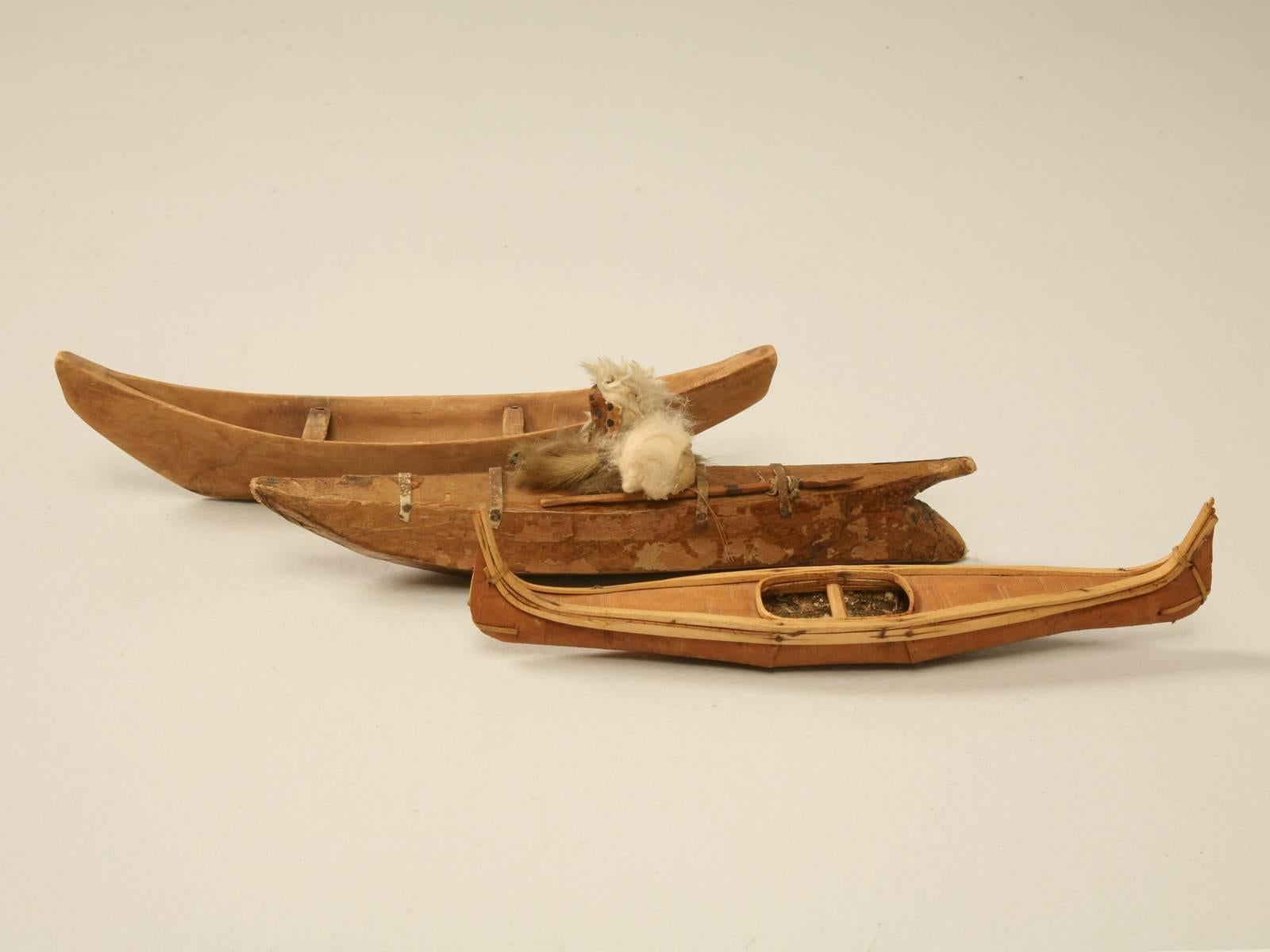 Eskimo Kayaks made in the early 1900s and were part of someone's private collection.
Measurements provided are for the canoe on the left. Measure: The middle is 3.5