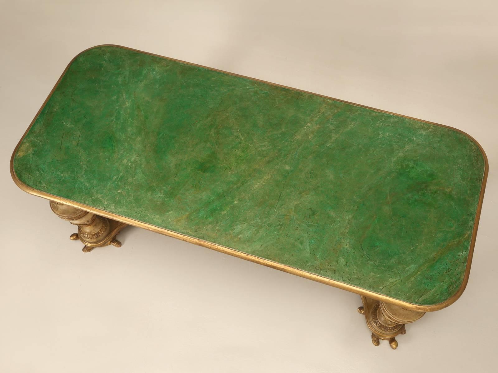 Incredible antique table from Napoli, Italy made during the 19th century. The finish appears to be all original, from the paint to the faux marble green top. What makes this table so interesting, are the hand-carved turtles used for the feet and I