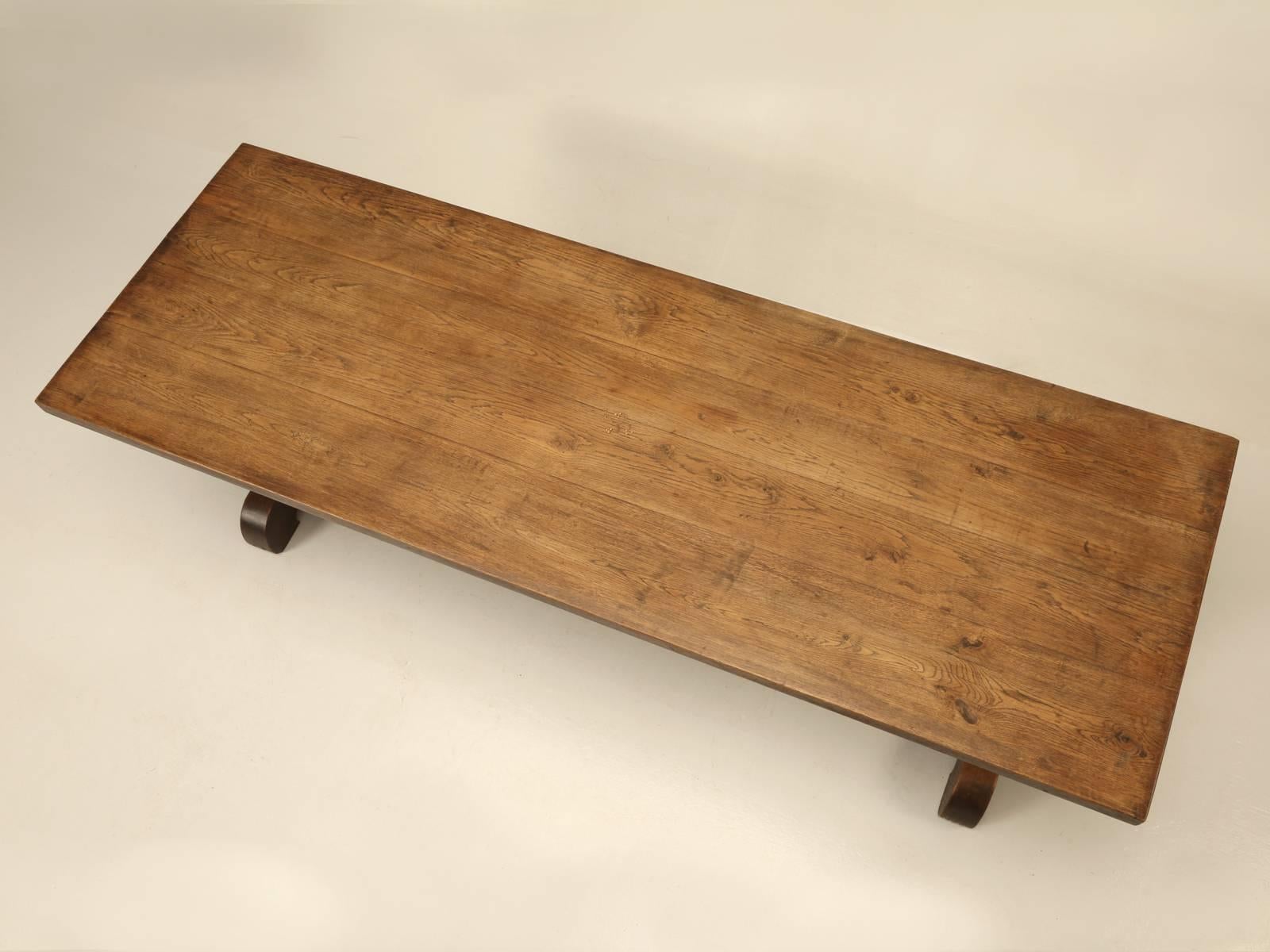 French solid oak trestle table, with the most unusual stretcher connecting the trestles and if that was not different enough, look at the copper flower inlay on the tabletop. This must have been made for someone very special and it looks like it was