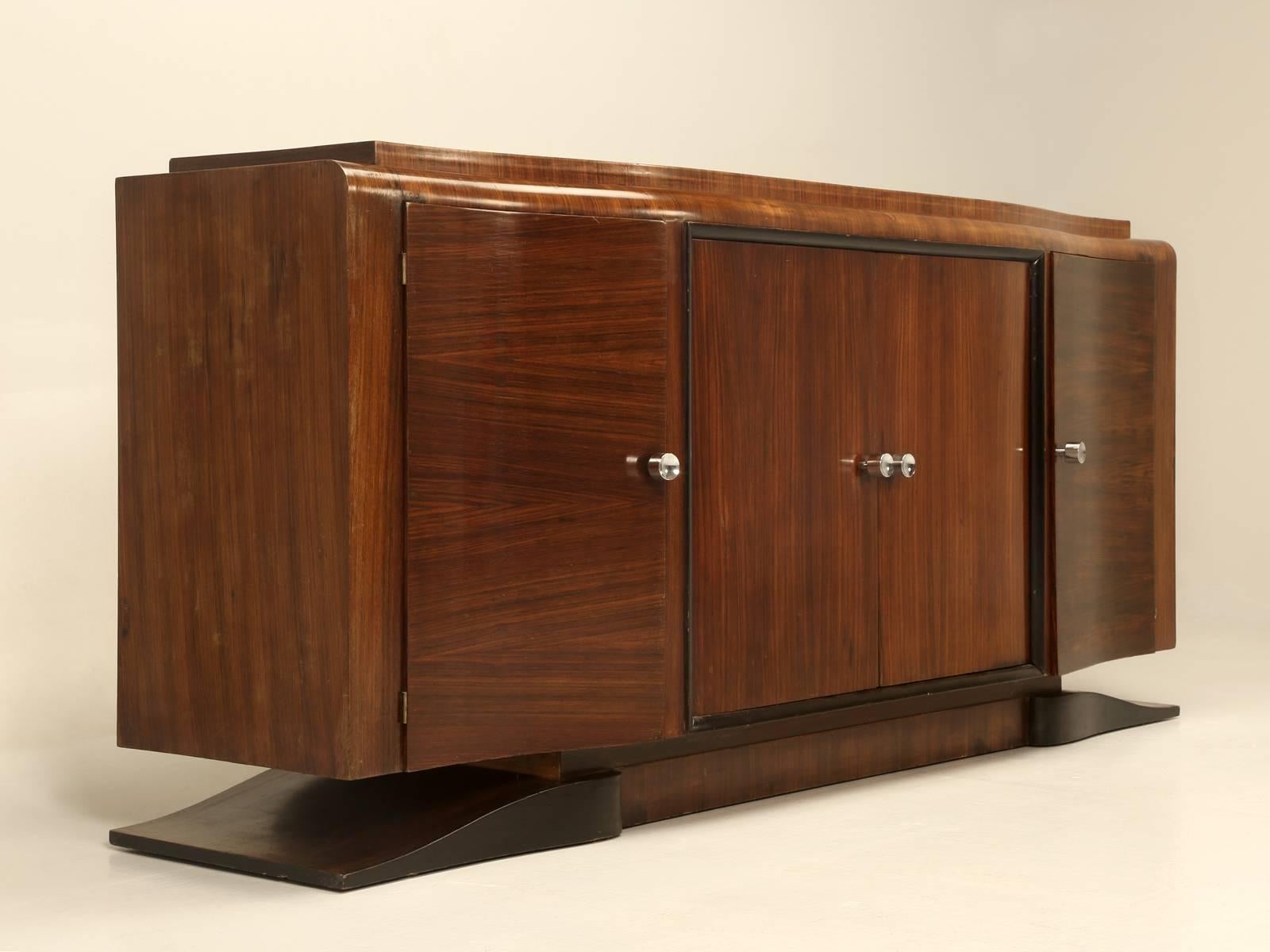 French Art Deco buffet, in what I would describe as in very nice original condition with some minor touchups. We thought the condition was a little too nice to refinish, but if you are particular, our finishing department can make it perfect for