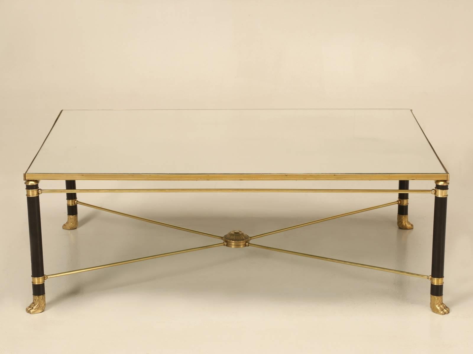 Beautifully detailed large French Mid-Century Modern coffee table, that can also be classified as neoclassical. Made from a combination of bronze, steel and brass in a very high quality manner. We also have listed on 1stdibs matching end tables and