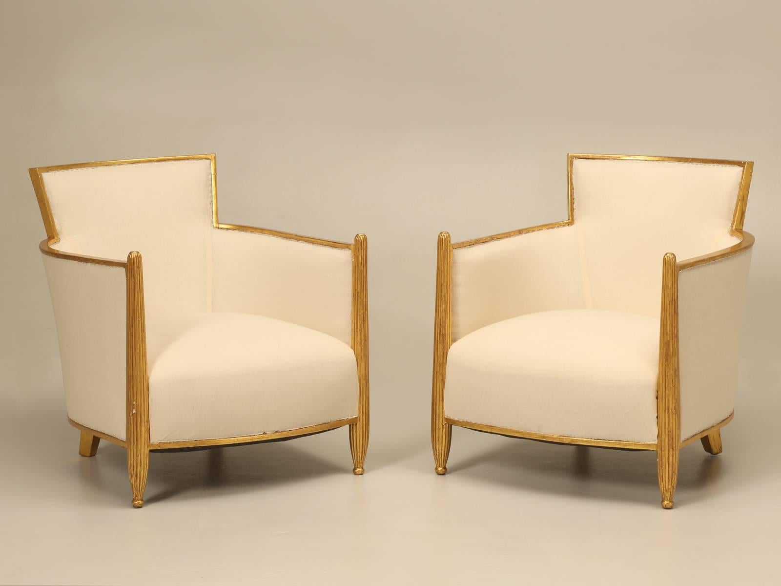 The absolute height of 1940s design still wearing their original 24-karat water gilded frames, that have not been touched up with paint. The Old Plank upholstery department completely stripped the frames to the bare wood, cut and installed wooden