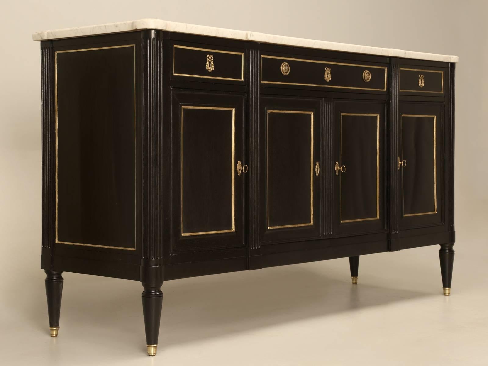 Vintage French Louis XVI style buffet heavily influenced by Jansen. The carcass was structurally restored by our Old Plank restoration department, before the entire buffet was hand-stripped to the bare wood and then slowly ebonized to a rich black