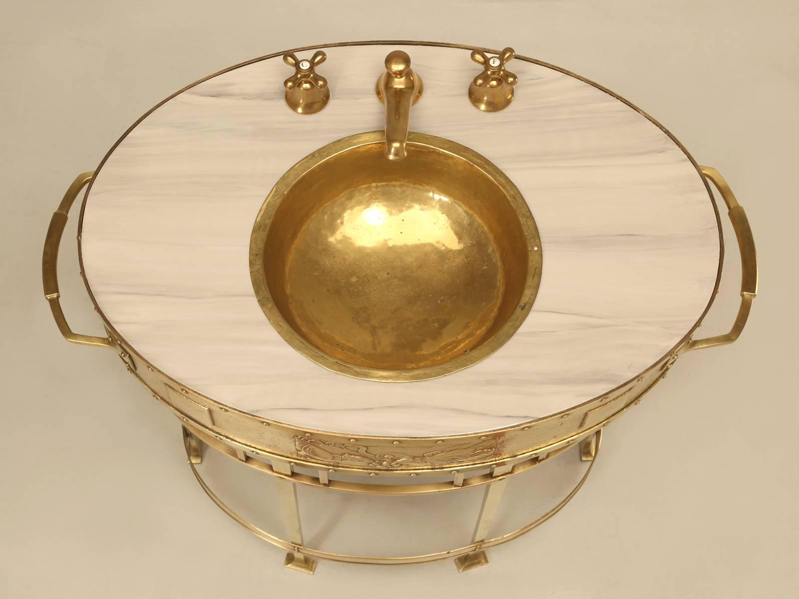 From the very moment we found this jardinière outside of Paris, we knew instantly that it would make for a great powder room vanity. Handmade, circa 1900, from brass and bronze to hold plants and the image of the proposed conversion you see here,