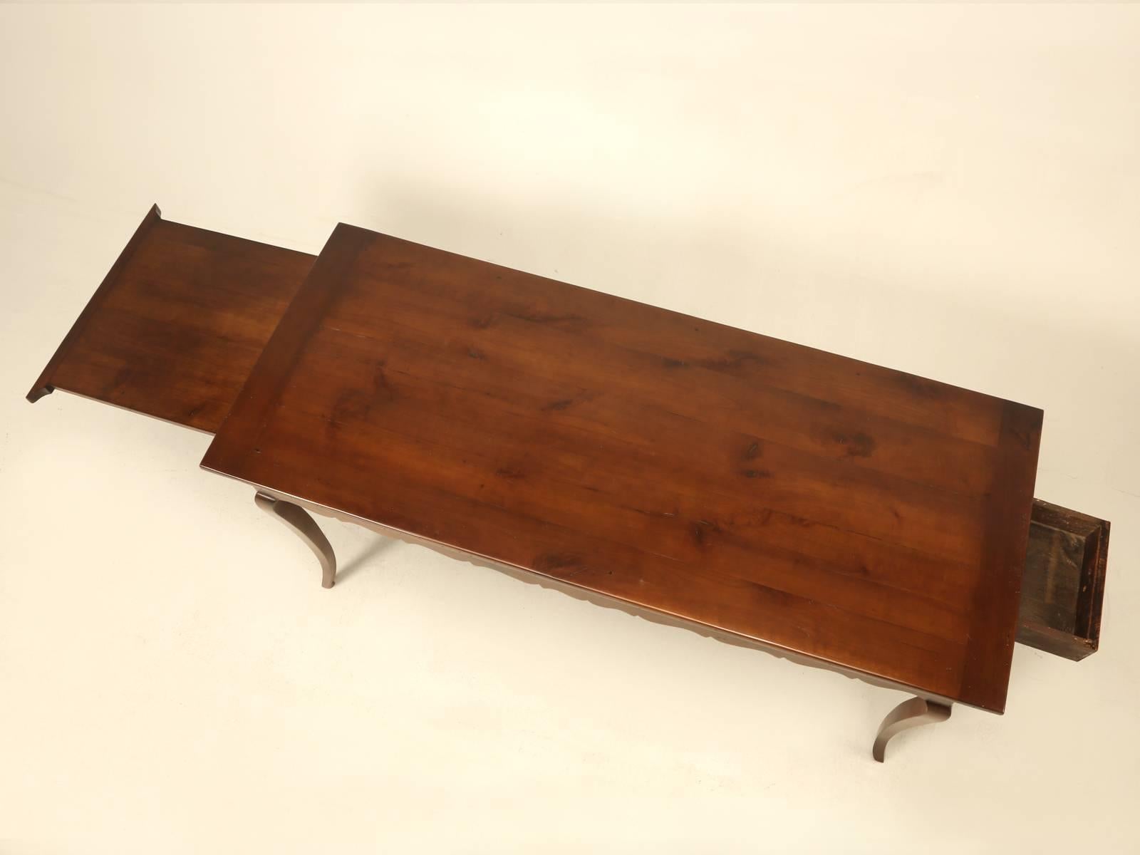 Now normally when I would look at this French dining table, I would immediately think it is 20th century, but after taking a much harder inspection, you immediately begin to notice things, like the thickness of the drawer, contrasting with the
