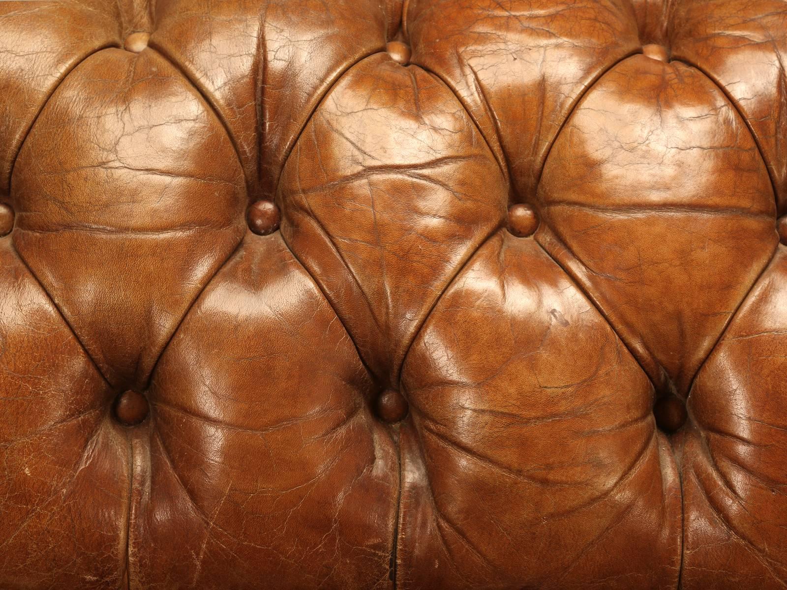 One of the nicest true antique (over 100 years old) unrestored leather Chesterfield sofas we have every owned. And the best thing about it is, that no one tried to restore the sofa, or re-dye the leather. This is the look that every manufacturer