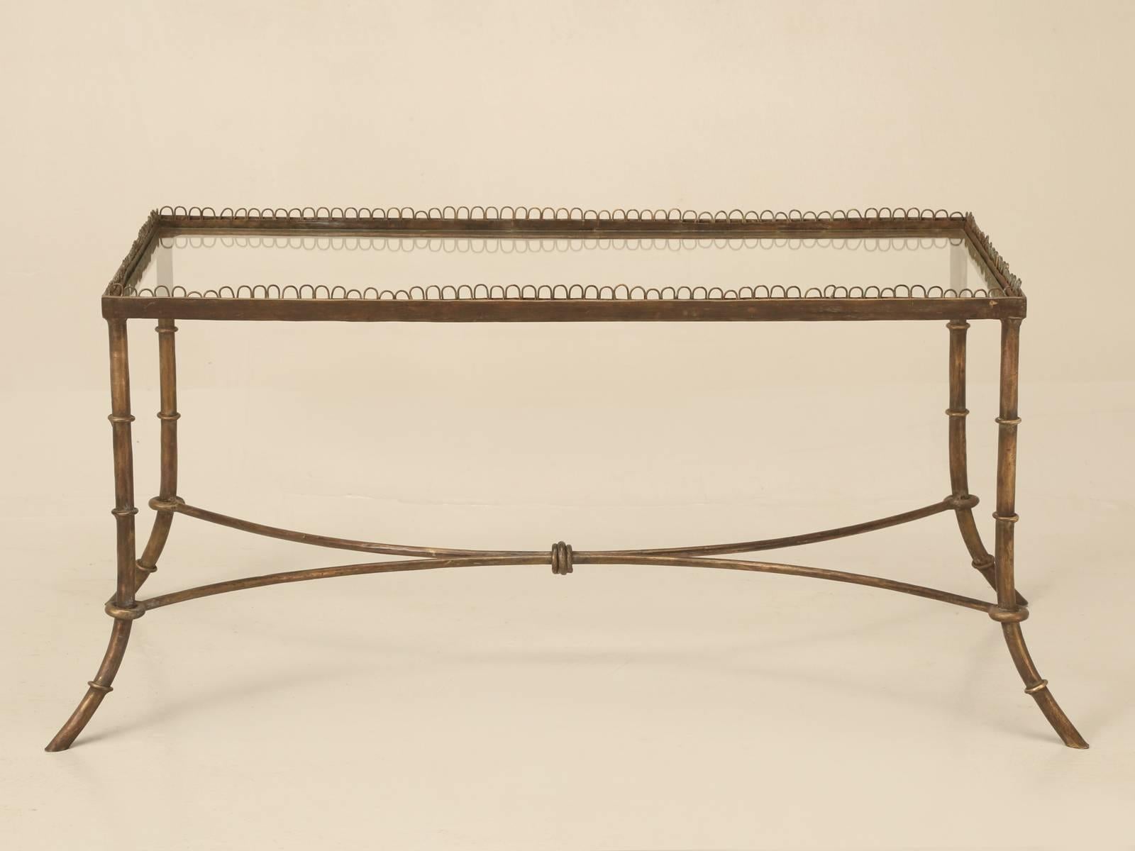 Vintage French brass coffee table (matching pair of end tables available on 1stdibs as well) in an unusual patina, that almost makes them look antique bronze on color. 

Measures: Height provided does not include the 5/8