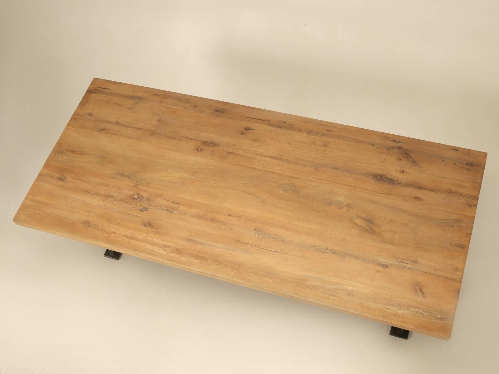 Industrial inspired steel and reclaimed white oak dining or kitchen table, built to your specifications. The table as shown was constructed with reclaimed white oak that we imported from France with a heavy-duty painted steel base. Options are